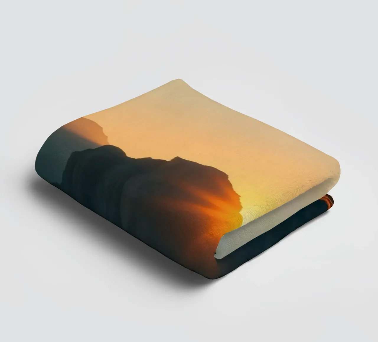 Sunset view over mountains with traditional structure towel by DesignDoodle