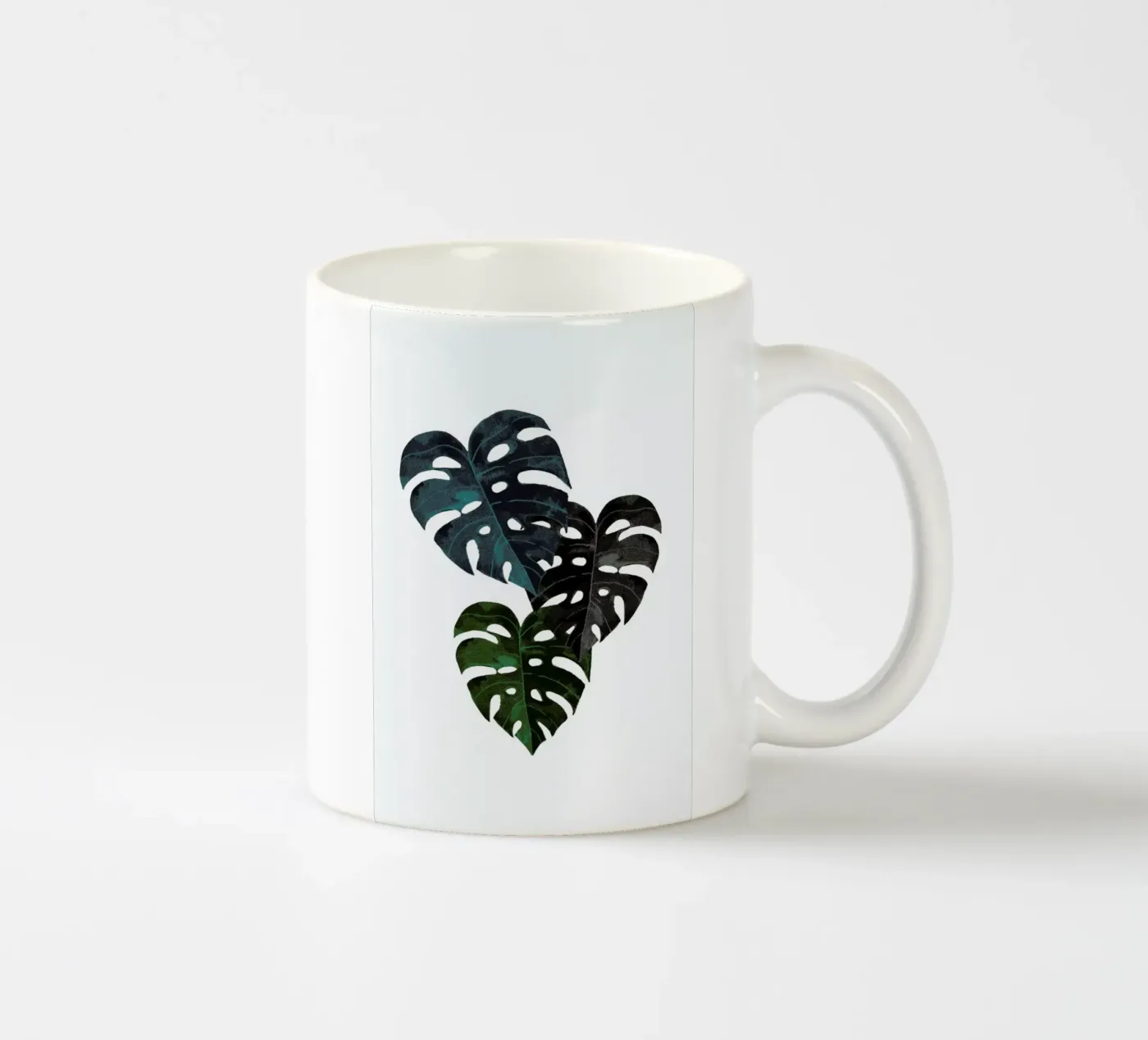 Monstera ceramic mug by Amy & Kurt