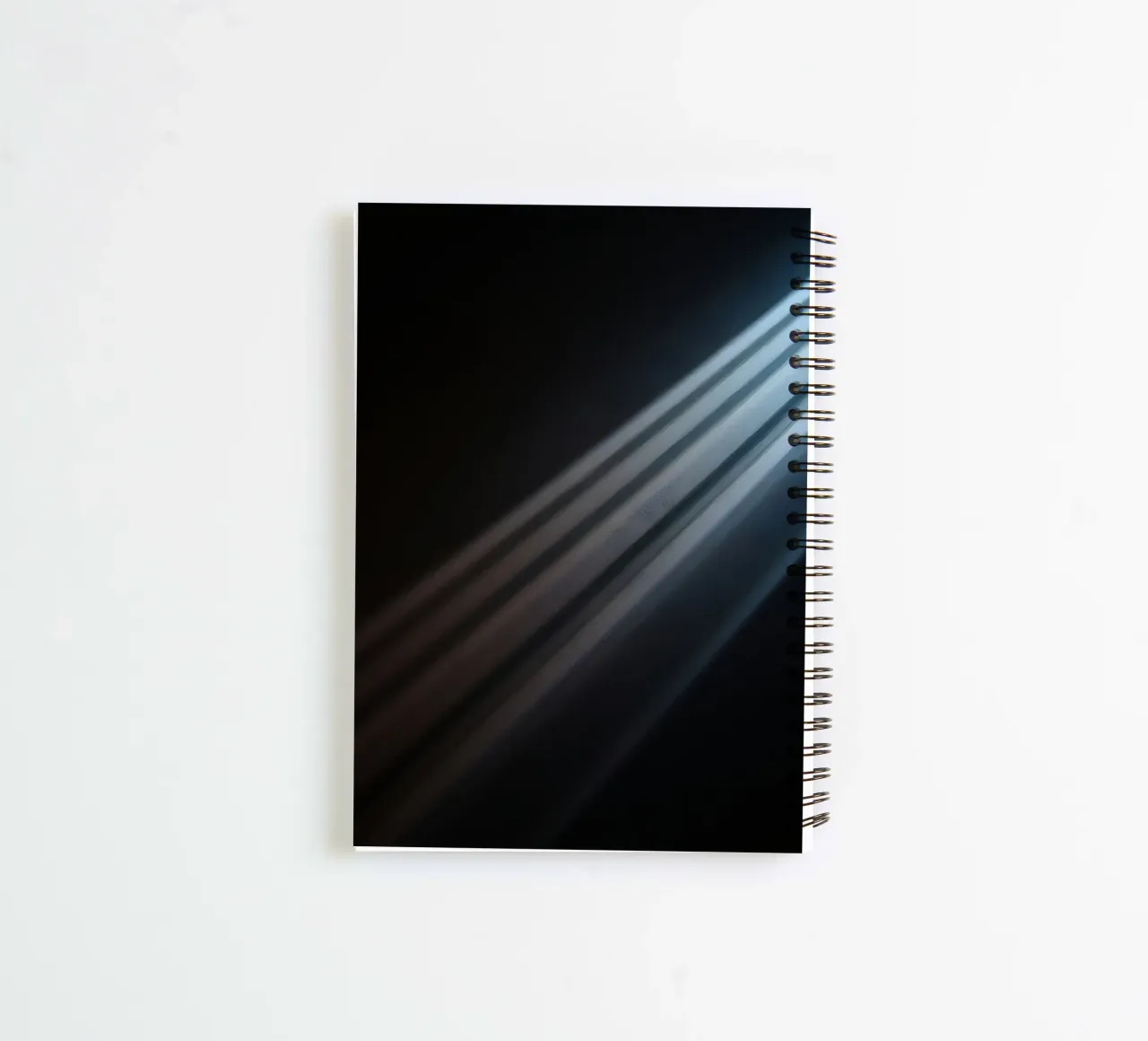 Elegant abstract light beams creating a serene wallpaper spiral notebook by DesignDoodle