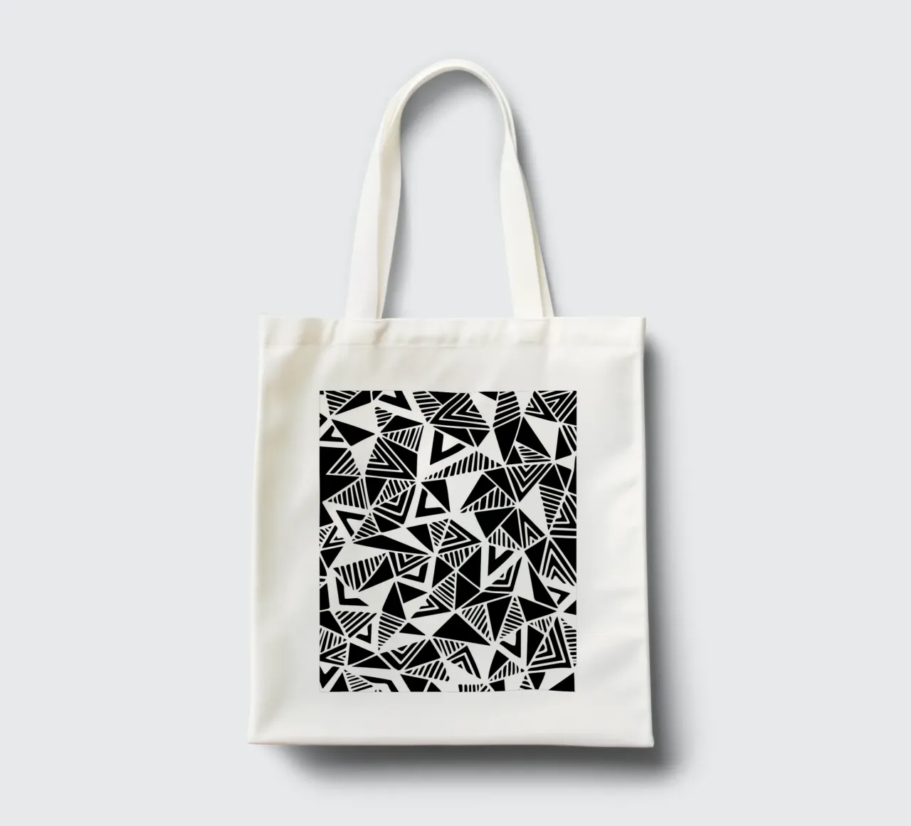 Jazzy Triangles Pattern borsa in juta da Kim Hubball Studio