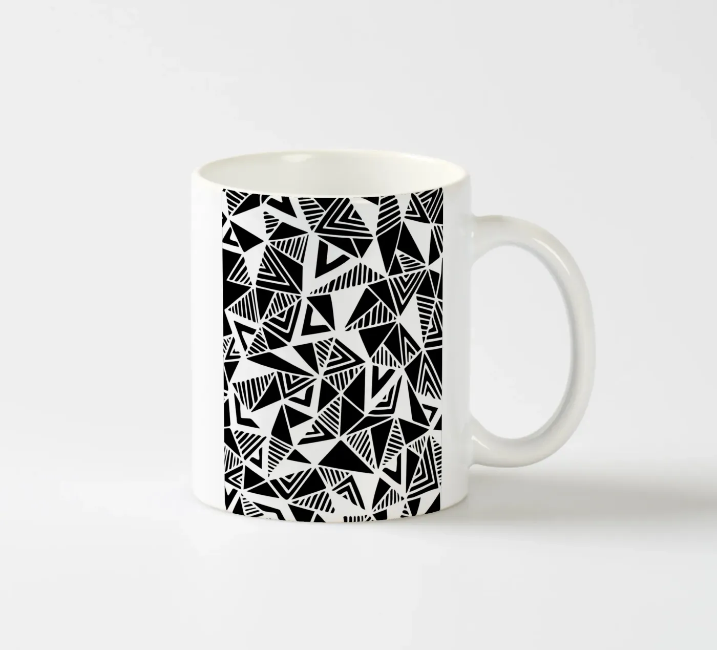 Jazzy Triangles Pattern ceramic mug by Kim Hubball Studio