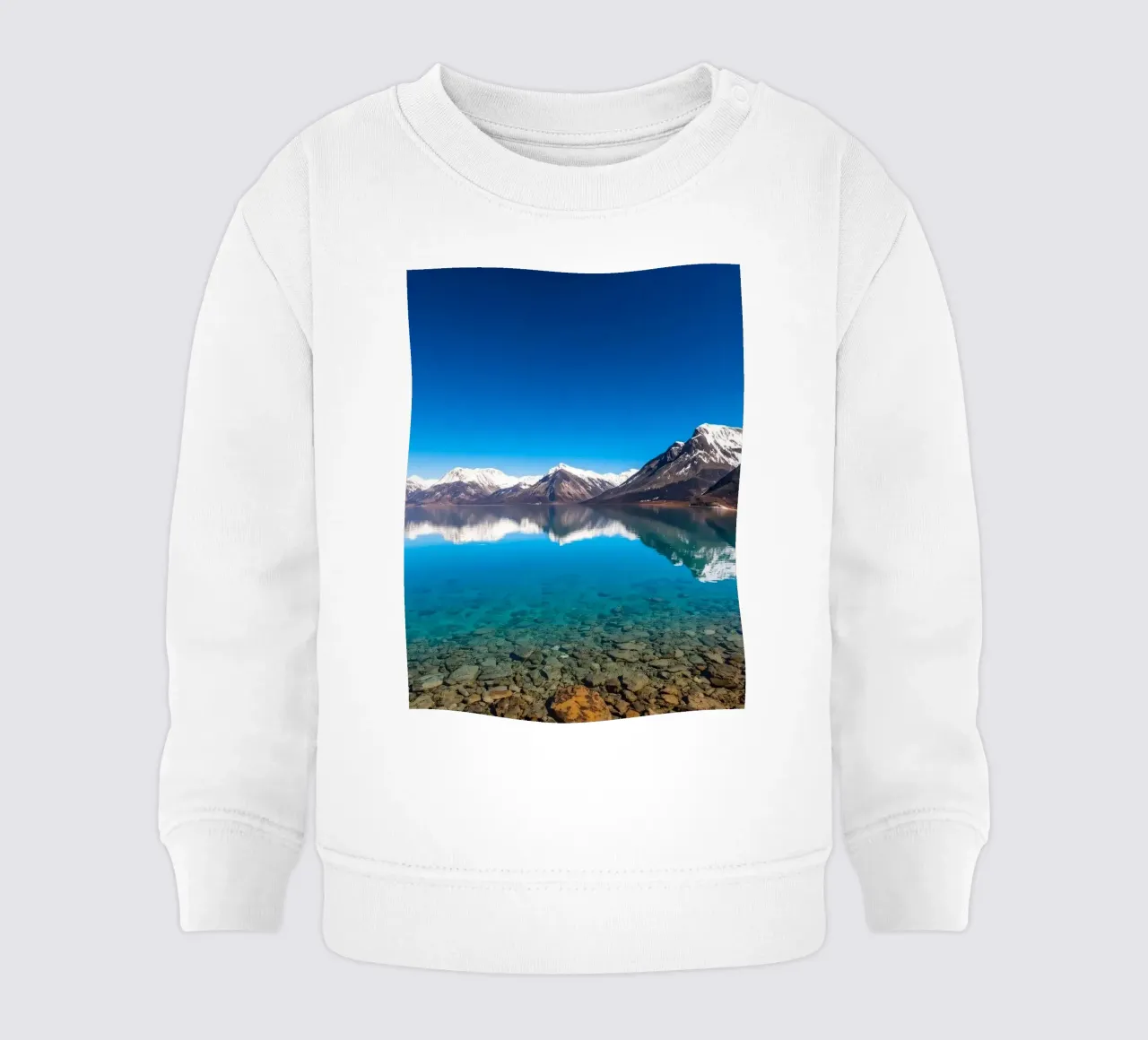 view of a serene lake surrounded by snow-capped mountains baby sweatshirt by DesignDoodle