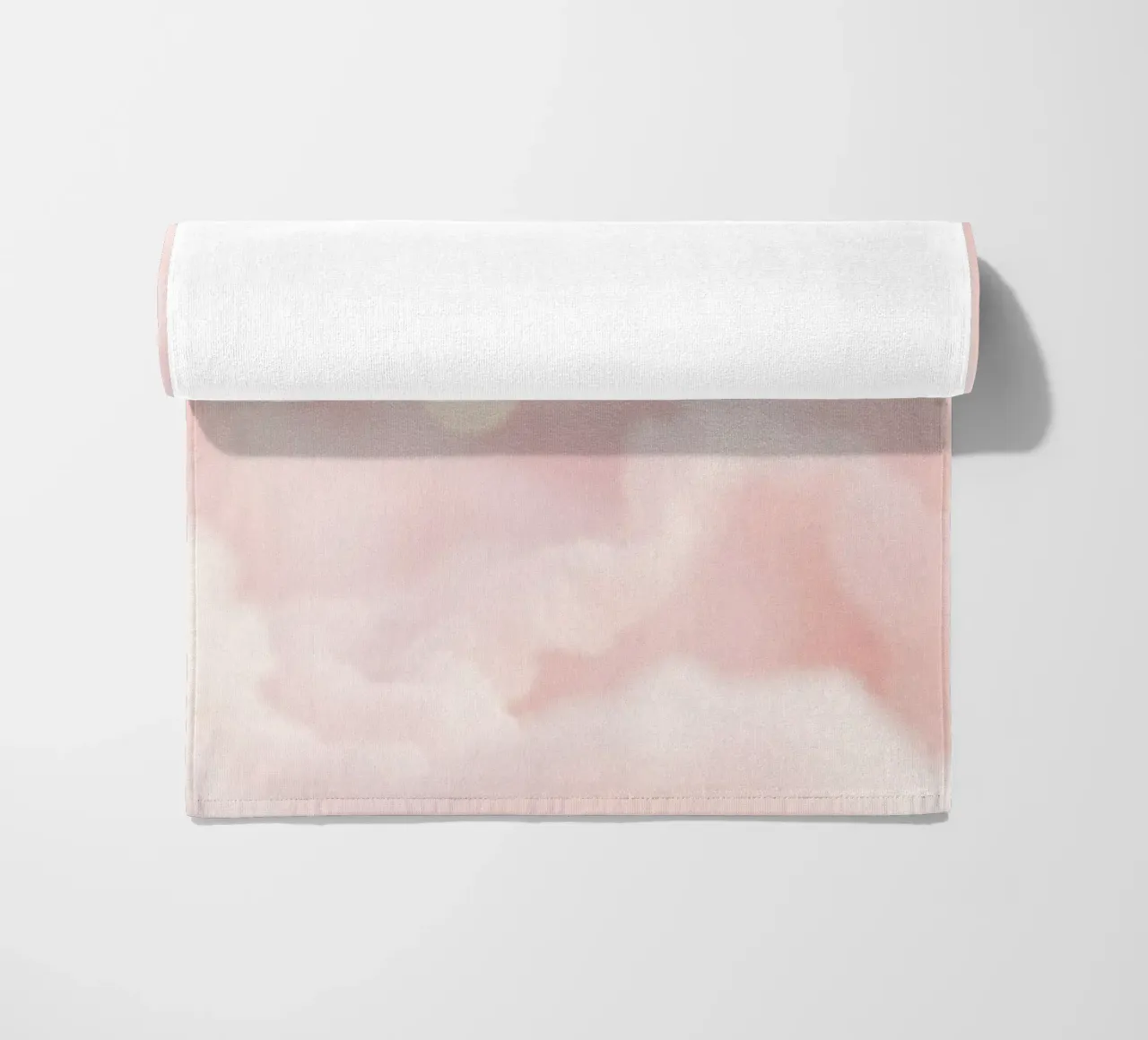 Soft pink abstract background with fluffy clouds and gentle beach towel by DesignDoodle