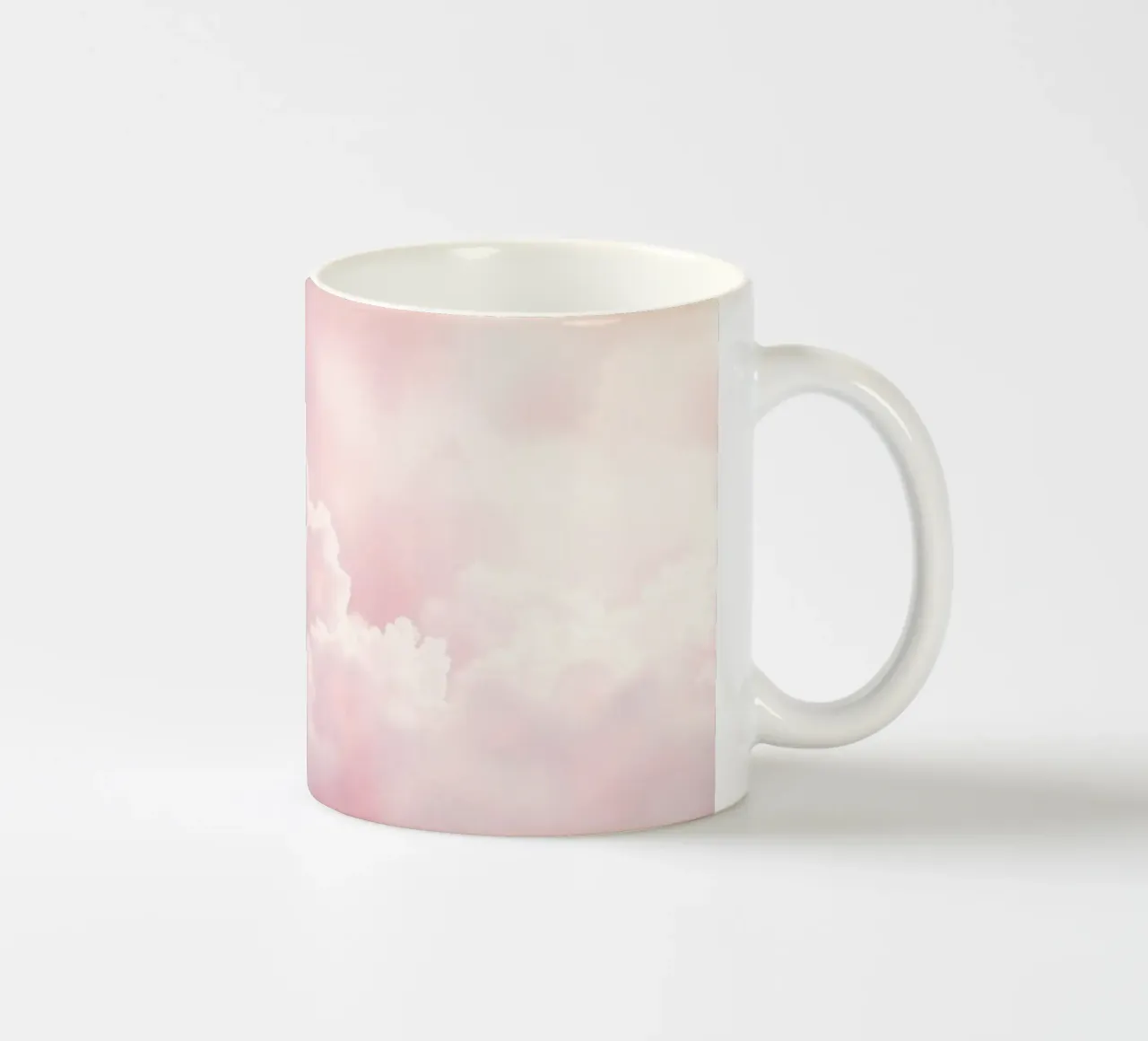 Soft pastel clouds create a serene abstract background ceramic mug by DesignDoodle