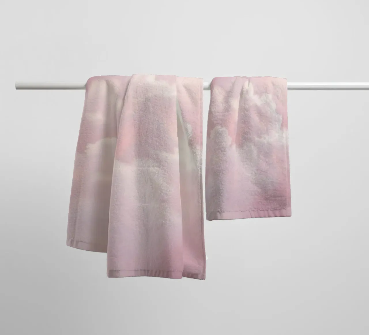 Soft pastel clouds create a serene abstract background towel by DesignDoodle