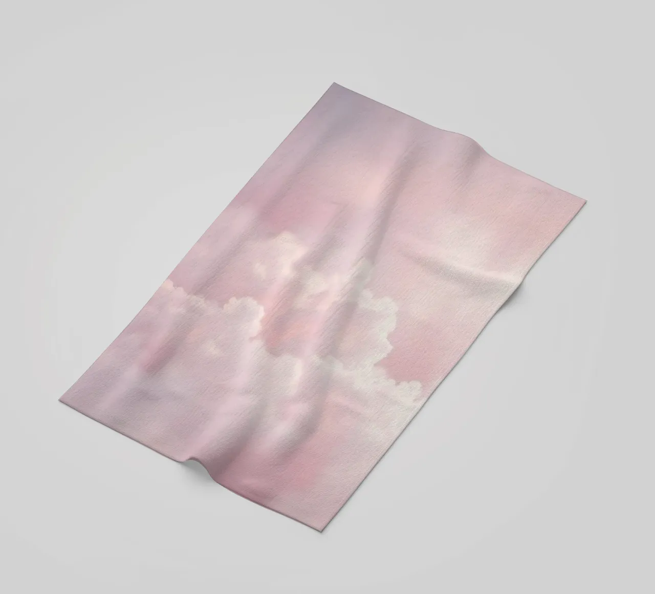 Soft pastel clouds create a serene abstract background beach towel by DesignDoodle