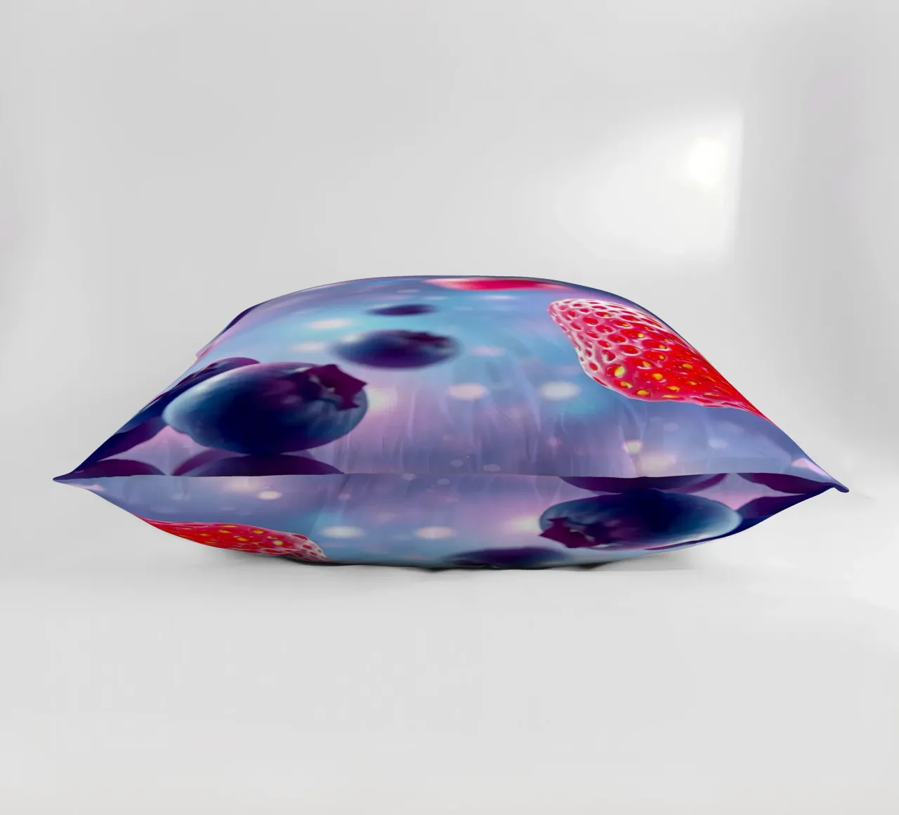 Vibrant strawberries and blueberries floating in space decorative cushion by DesignDoodle