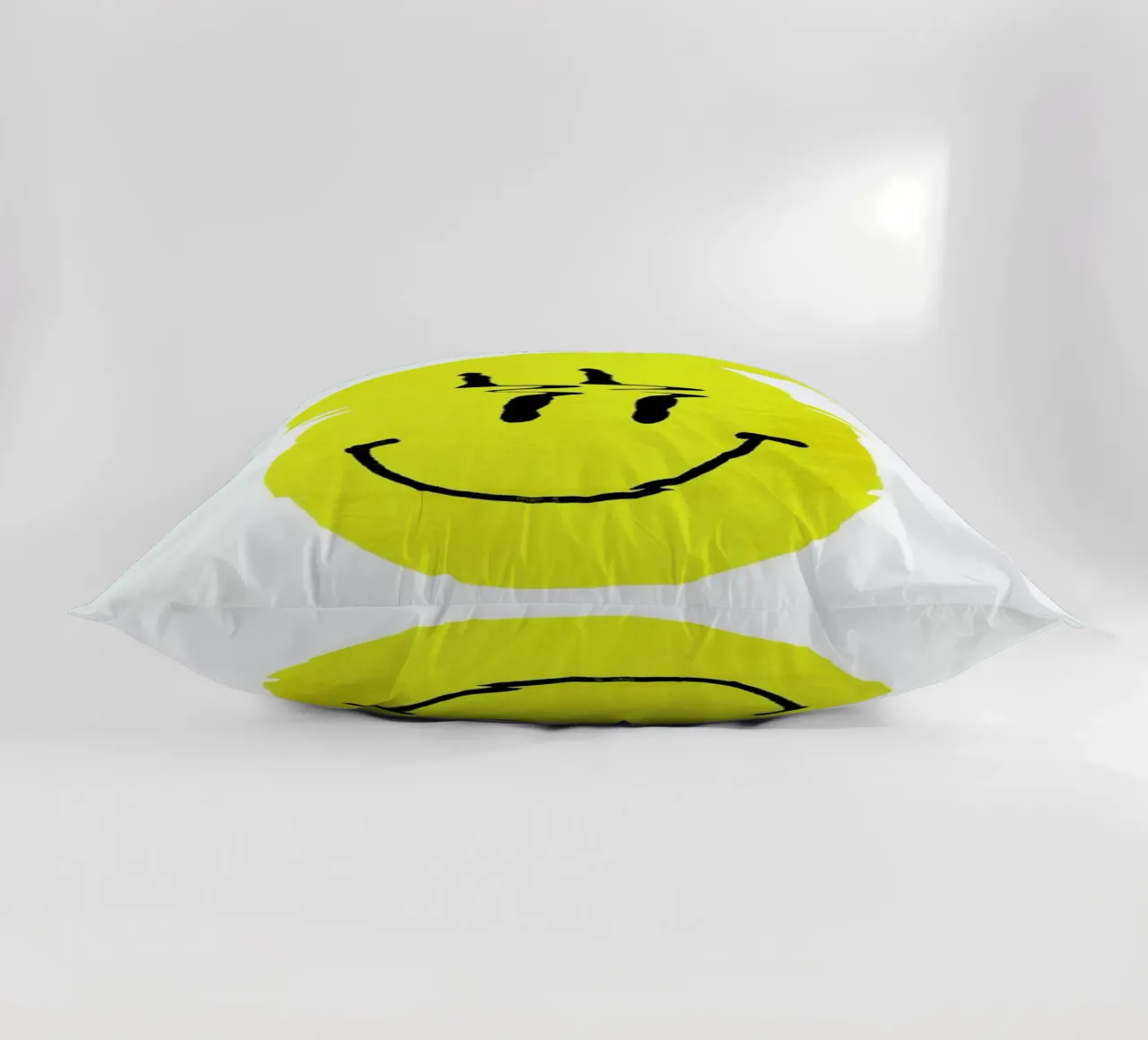 Smiley decorative cushion by Ali Gulec