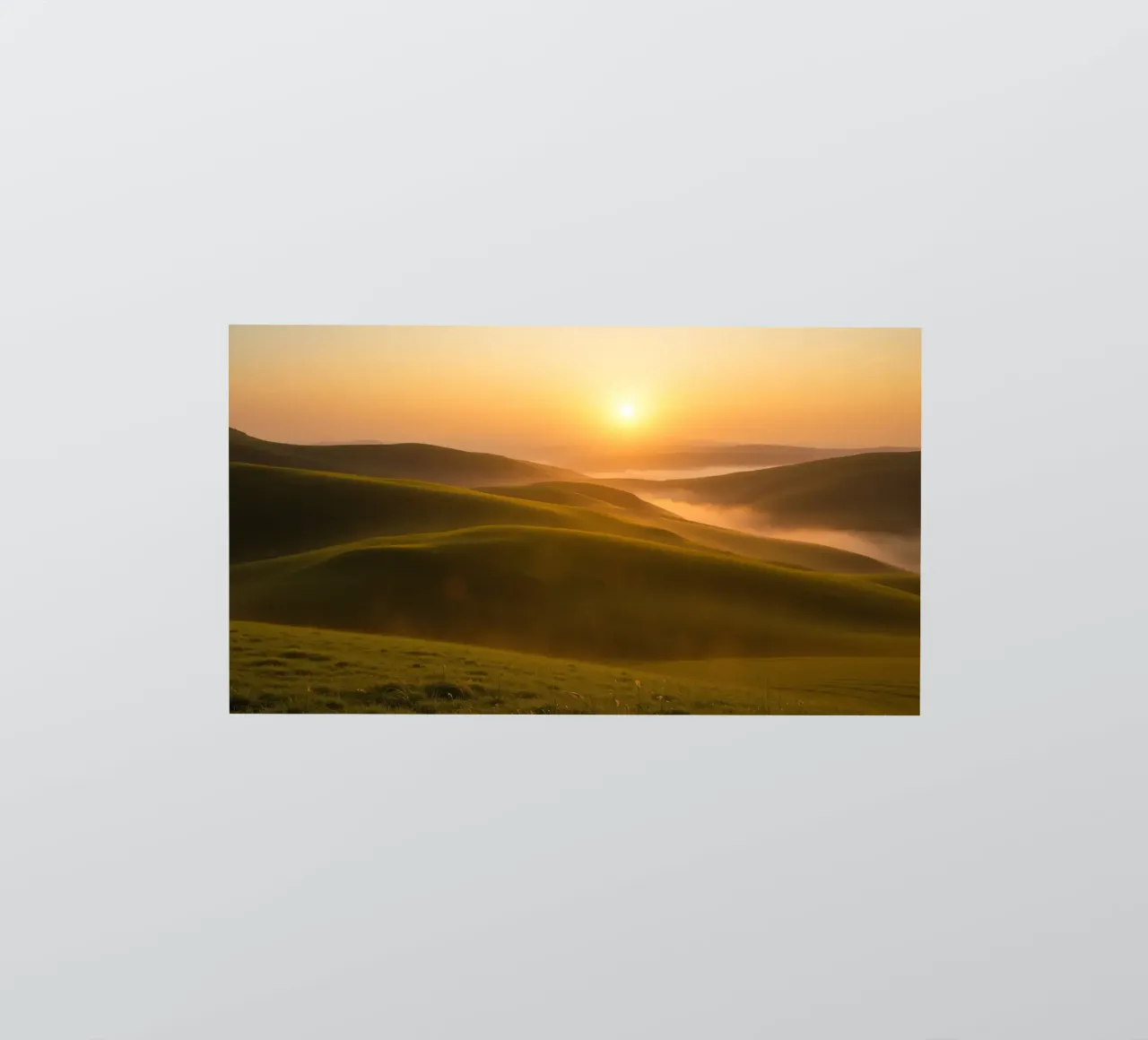 Sunset over rolling green hills with mist creating a serene sticker by DesignDoodle