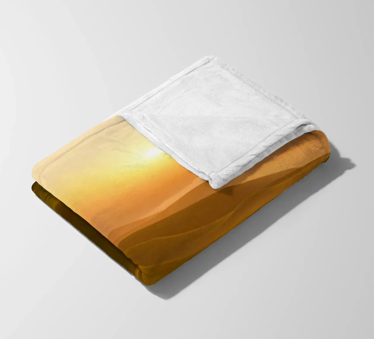 Sunset over rolling green hills with mist creating a serene fleece blanket by DesignDoodle