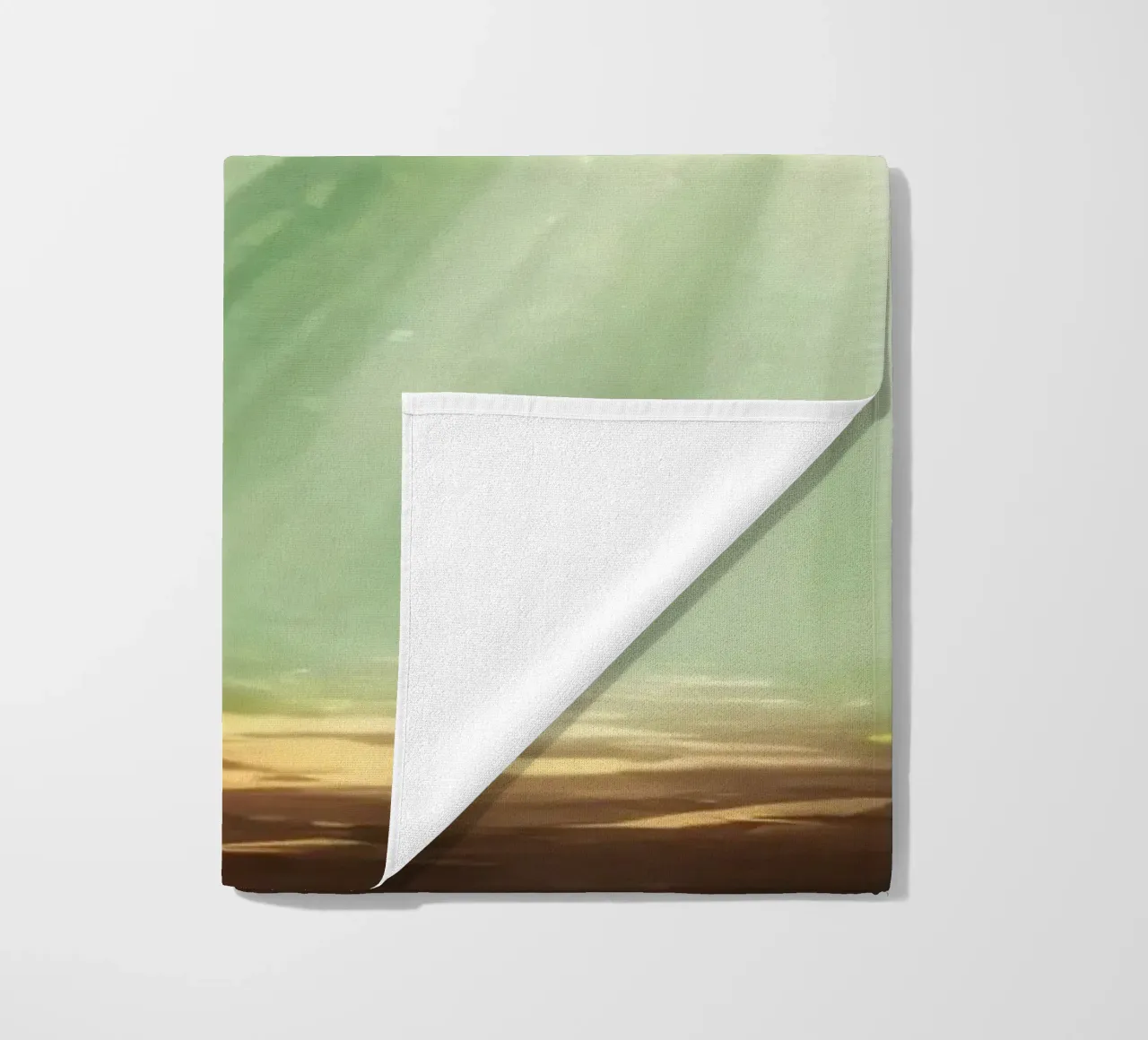 Sunlight filters through a lush forest creating a serene beach towel by DesignDoodle