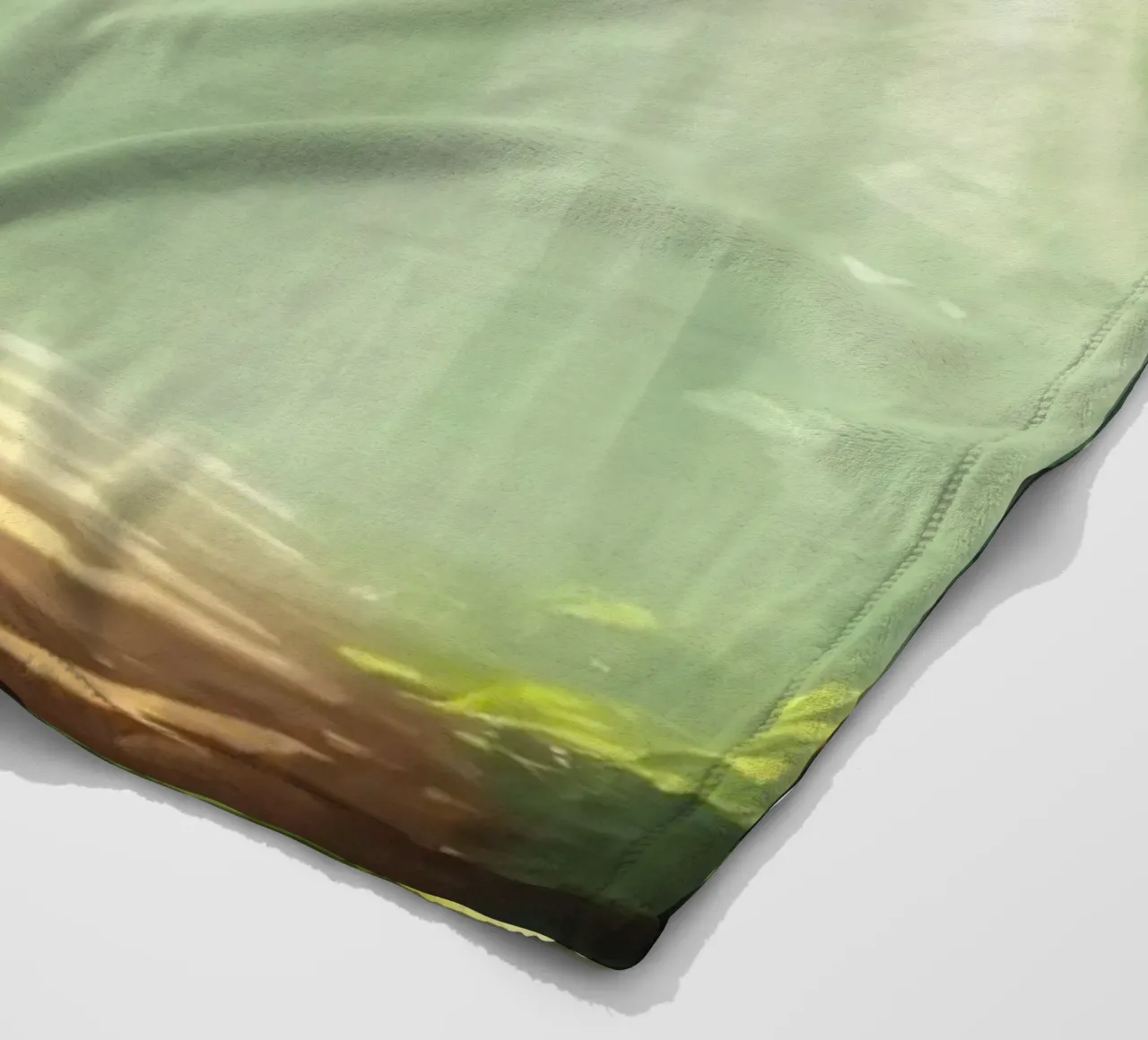 Sunlight filters through a lush forest creating a serene fleece blanket by DesignDoodle