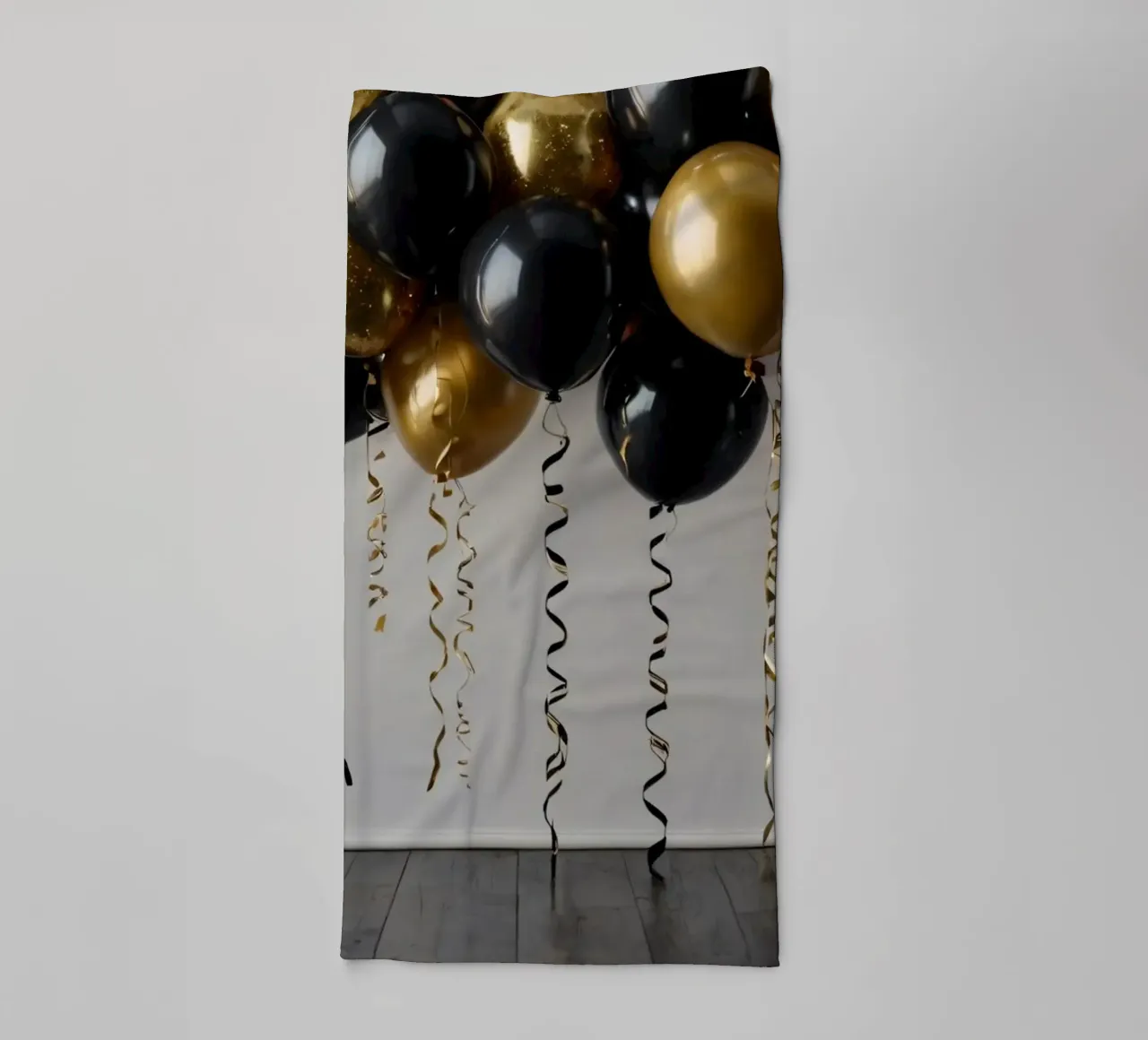 Celebration backdrop featuring black and gold balloons towel by DesignDoodle
