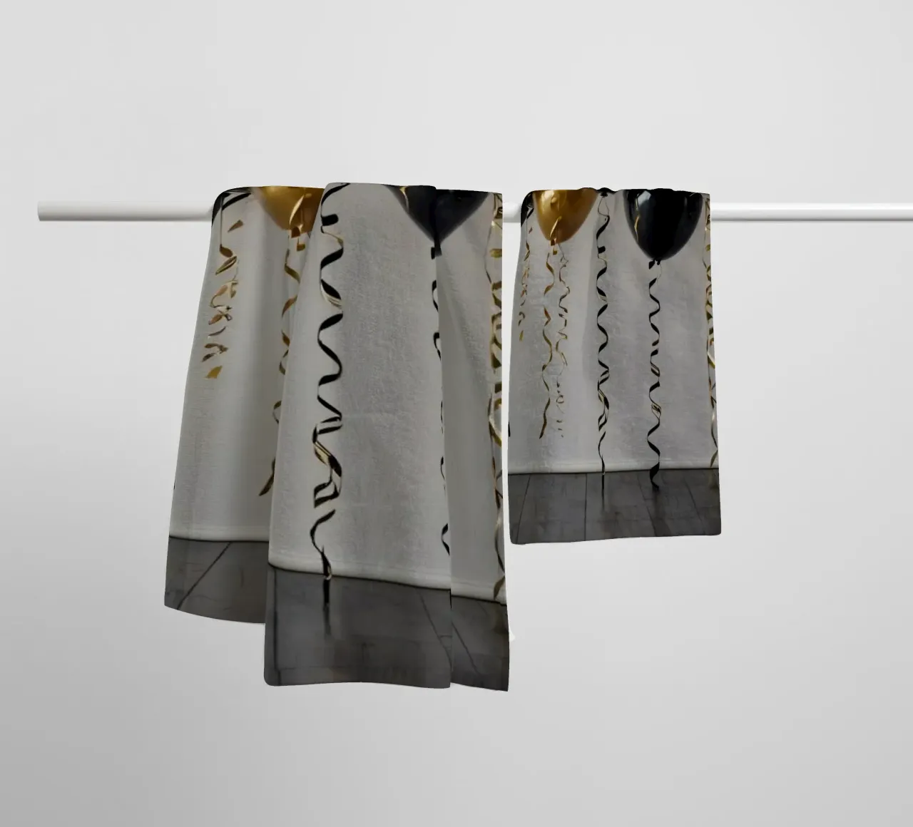 Celebration backdrop featuring black and gold balloons towel by DesignDoodle