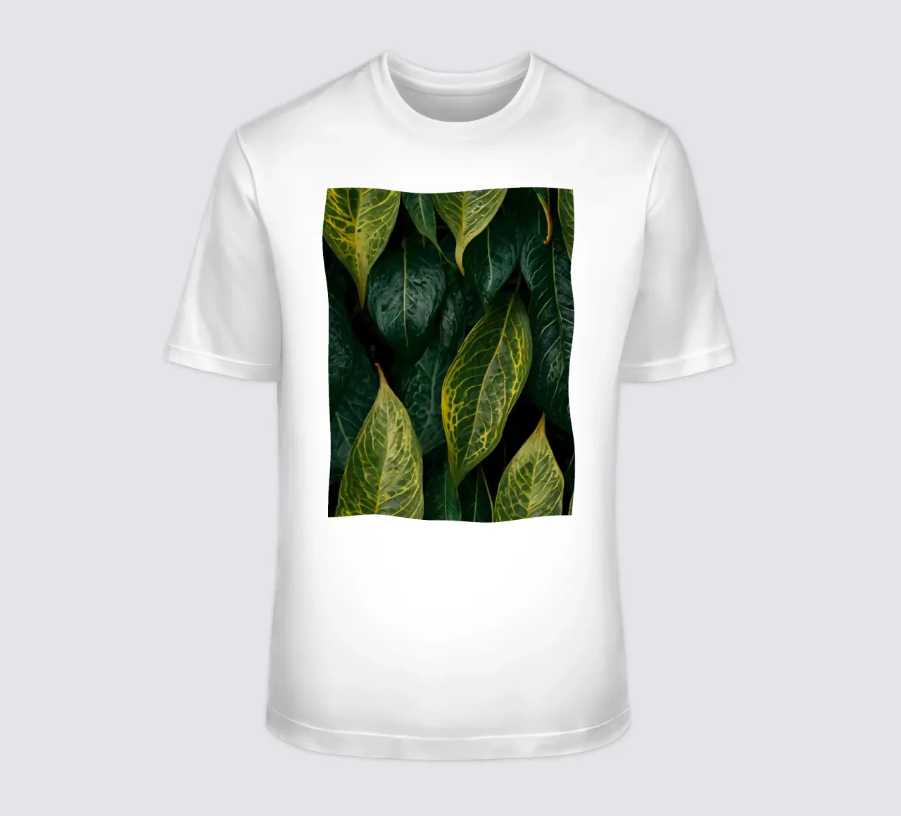 Foglie verdi e rigogliose, con trame intricate e tonalità vivaci. t-shirt da DesignDoodle