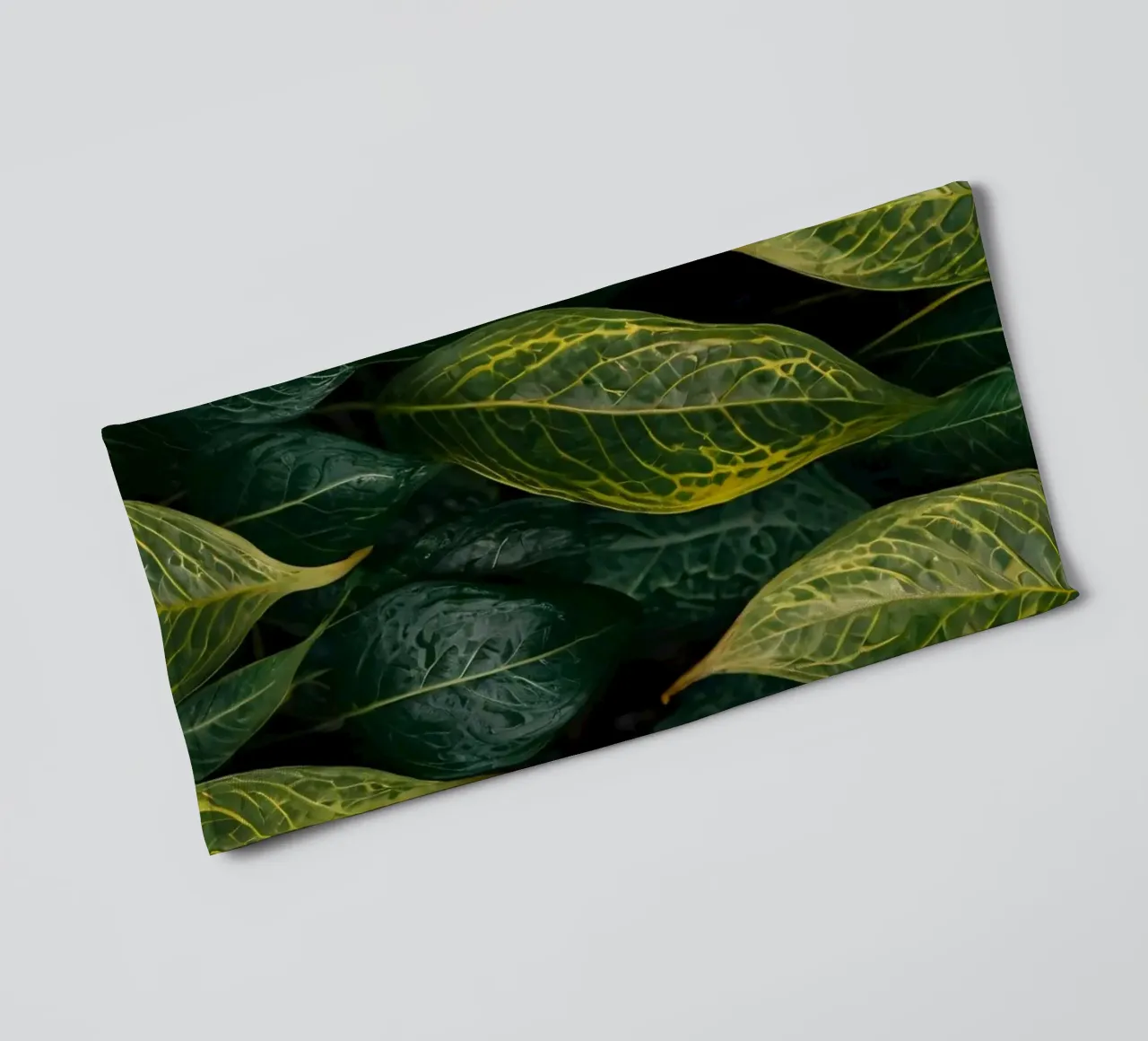 Lush green leaves with intricate textures and vibrant hues towel by DesignDoodle