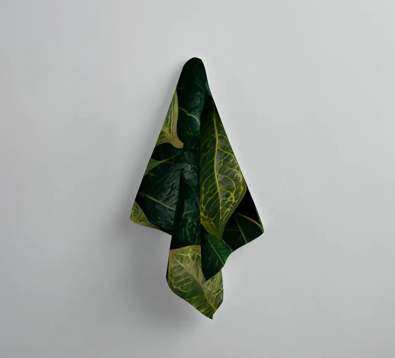 Lush green leaves with intricate textures and vibrant hues towel by DesignDoodle