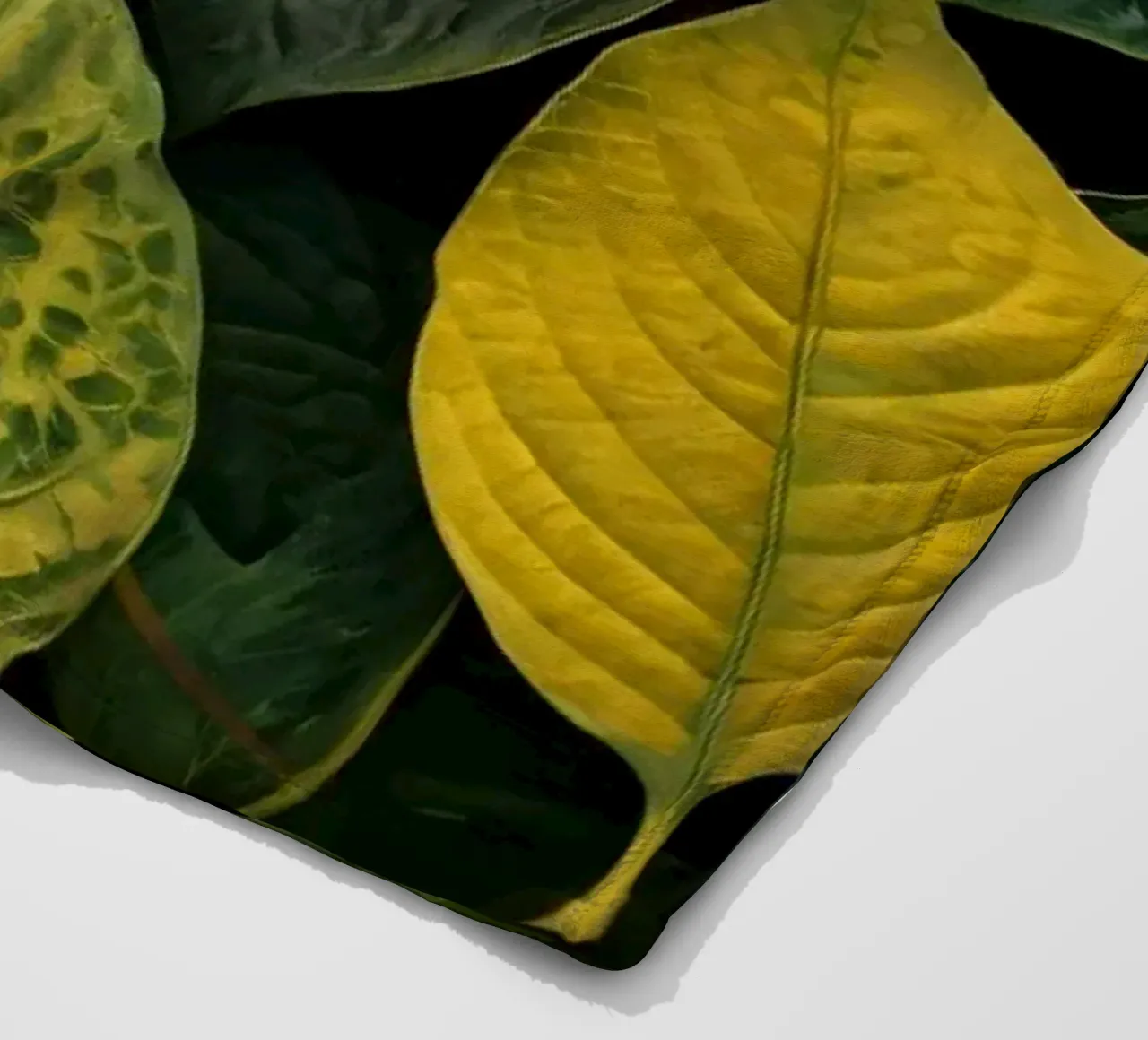 Lush green and yellow leaves create a vibrant abstract wallp fleece blanket by DesignDoodle