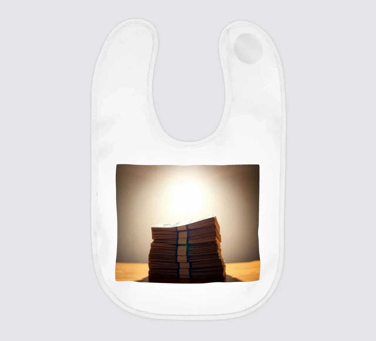 Stacked currency bundles illuminated by soft glow in a dimly baby bib by DesignDoodle