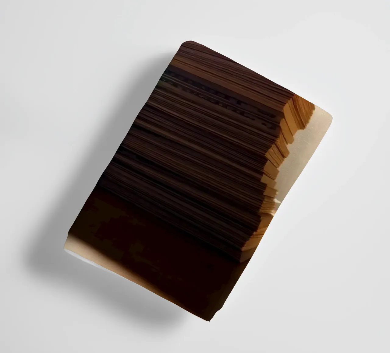 Stacked currency bundles illuminated by soft glow in a dimly towel by DesignDoodle