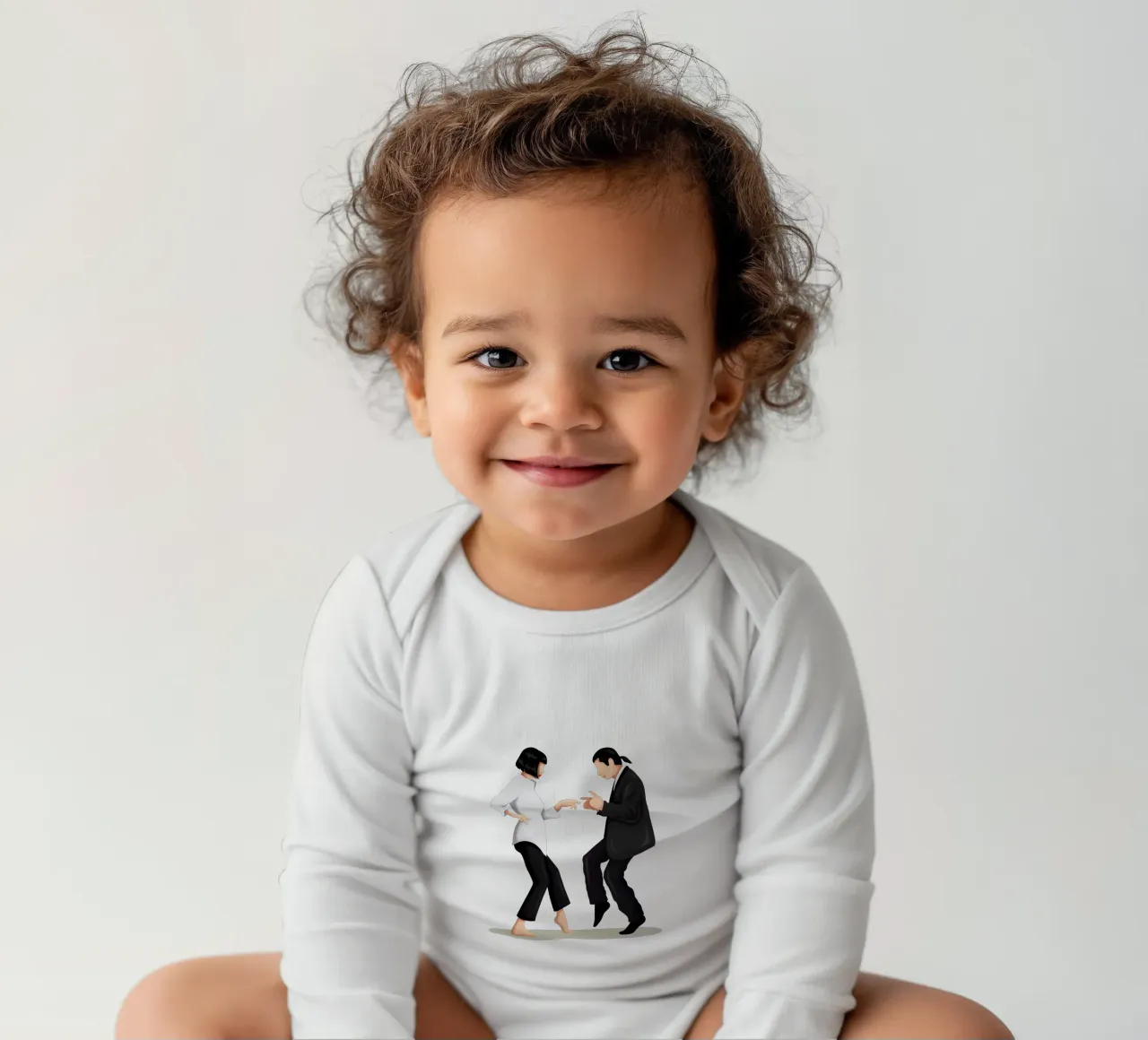 Pulp Fiction long-sleeve baby romper by Nour Tohme