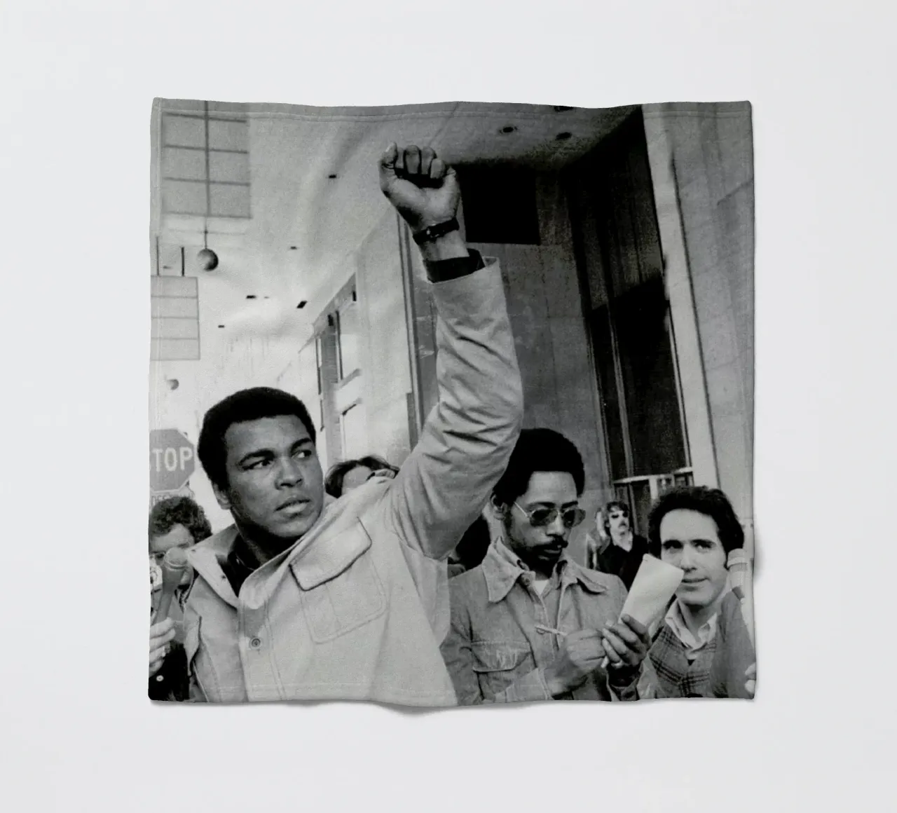 Muhammad Ali raises his Fist coperta in pile da Gallery Print and Art Limited