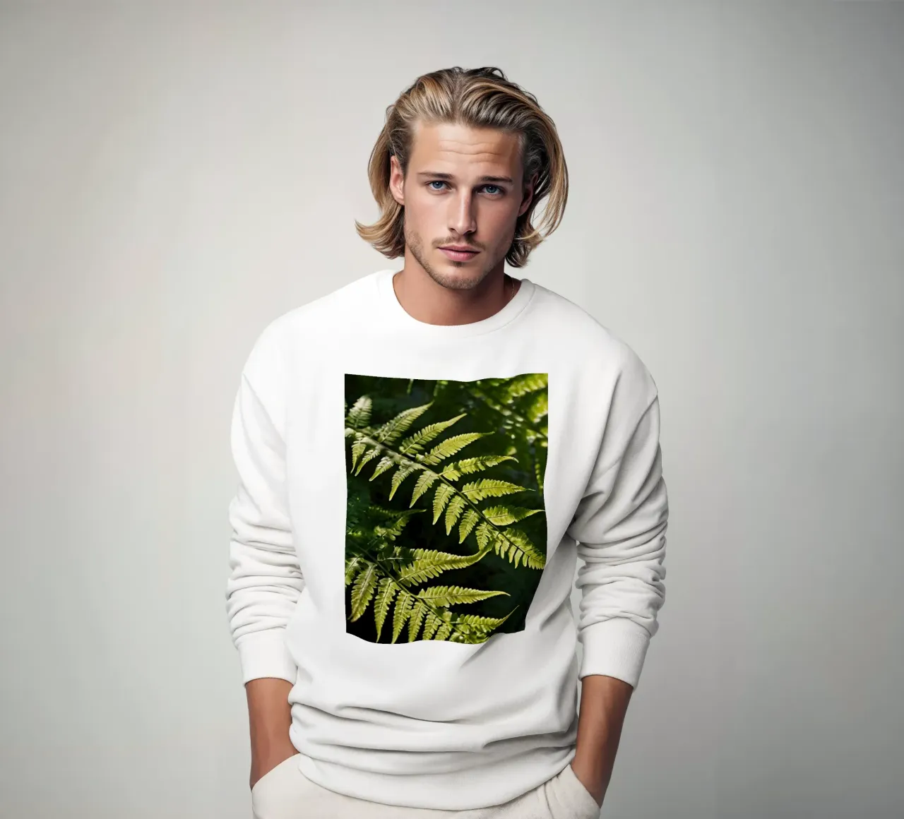 Sunlight filters through lush green ferns in a tranquil fore sweatshirt by DesignDoodle