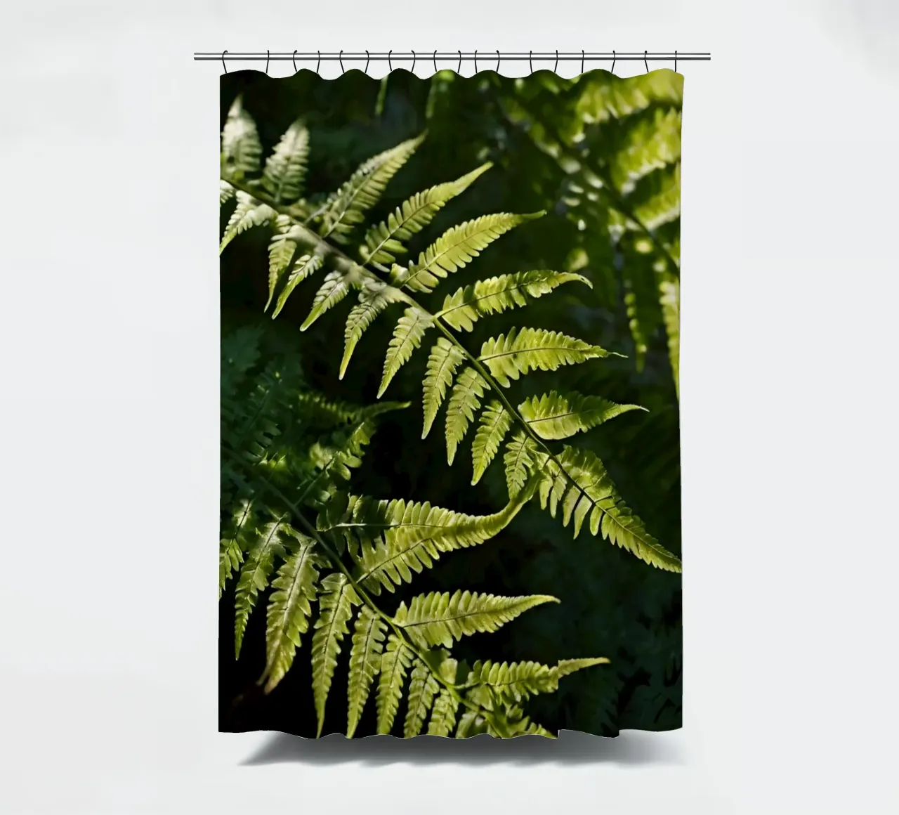 Sunlight filters through lush green ferns in a tranquil fore shower curtain by DesignDoodle