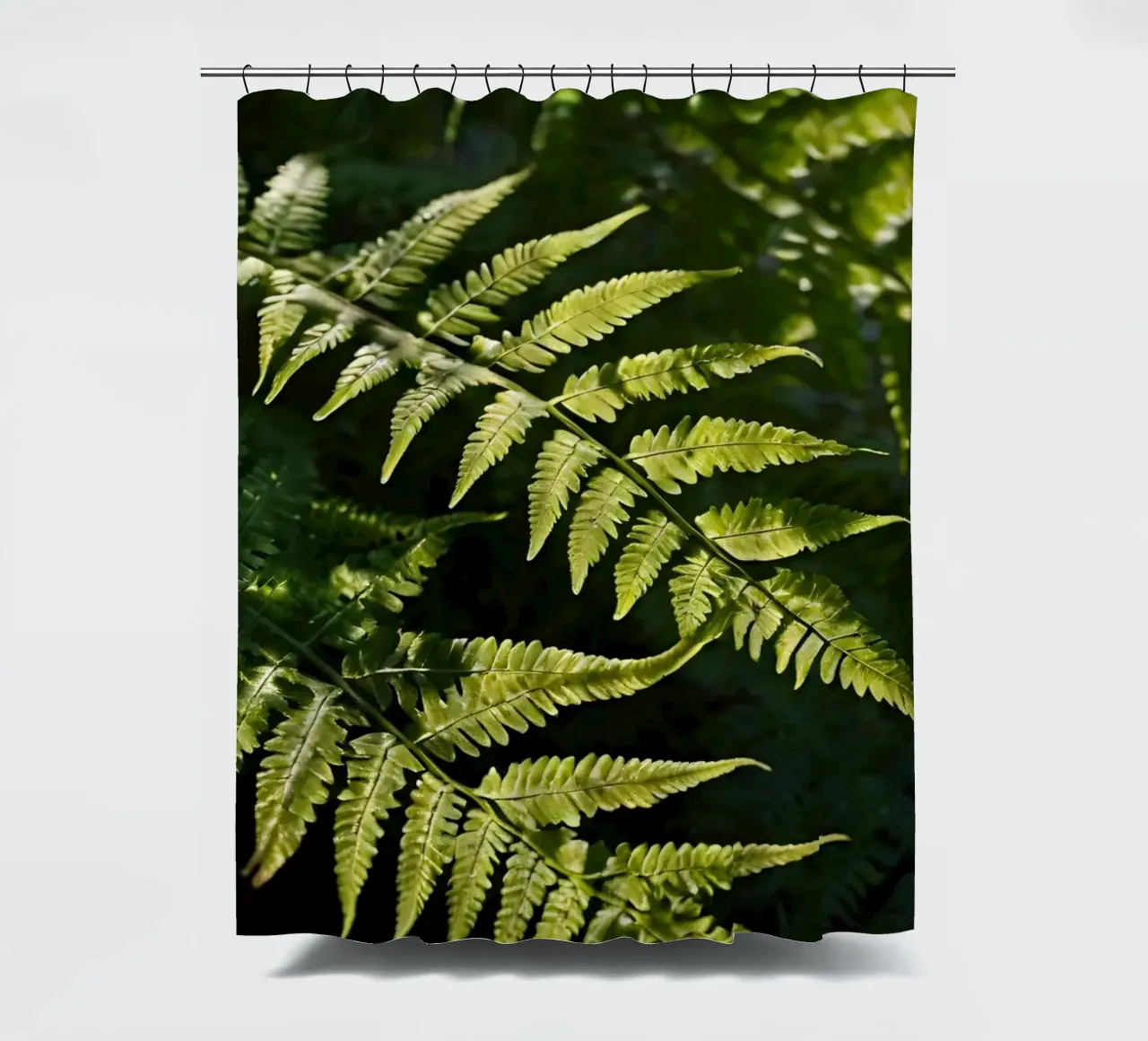 Sunlight filters through lush green ferns in a tranquil fore shower curtain by DesignDoodle