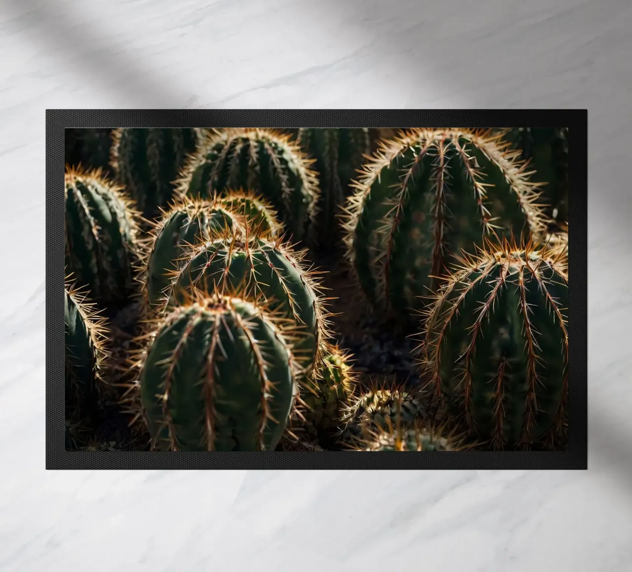 Close-up view of vibrant cacti with prominent spines doormat by DesignDoodle