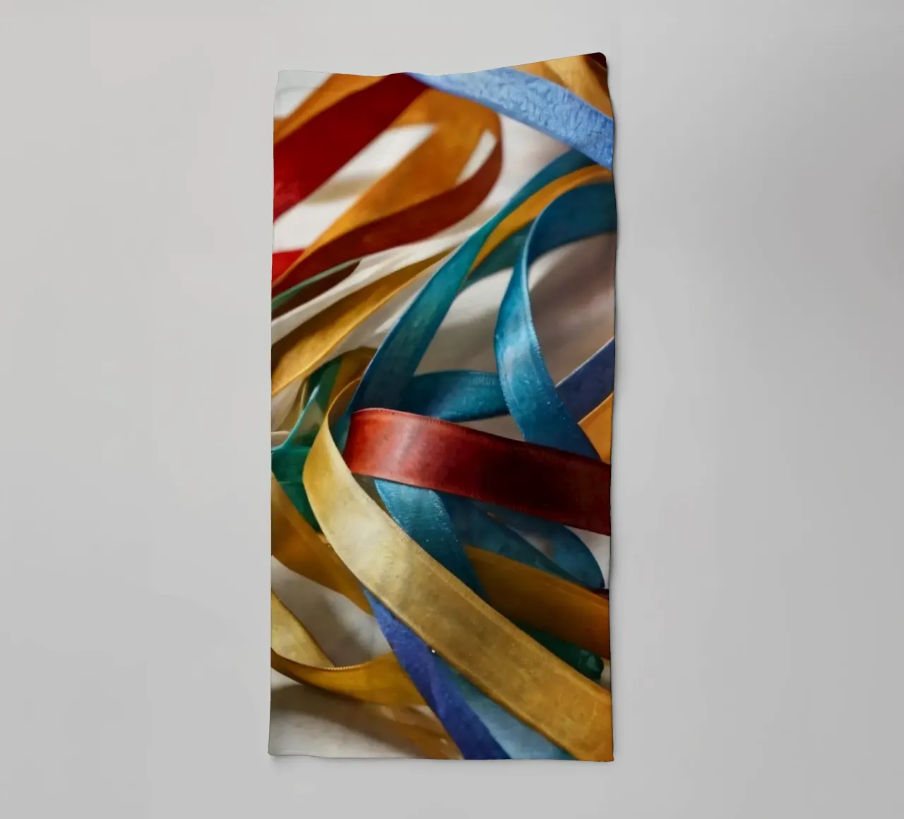 Vibrant collection of colorful ribbons scattered towel by DesignDoodle