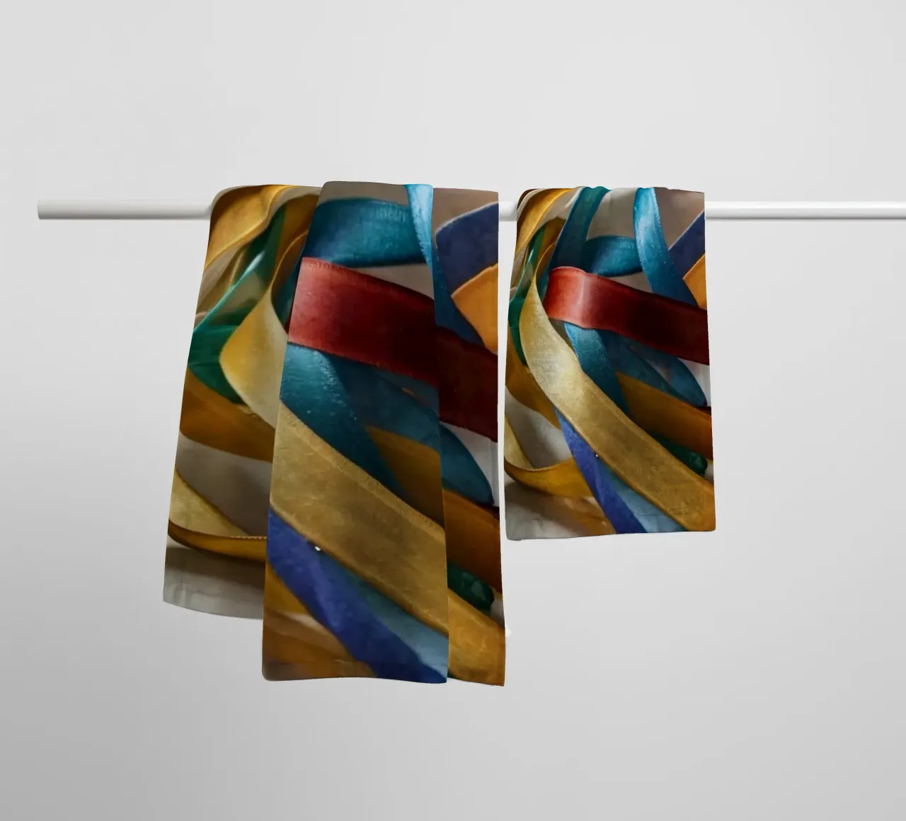 Vibrant collection of colorful ribbons scattered towel by DesignDoodle