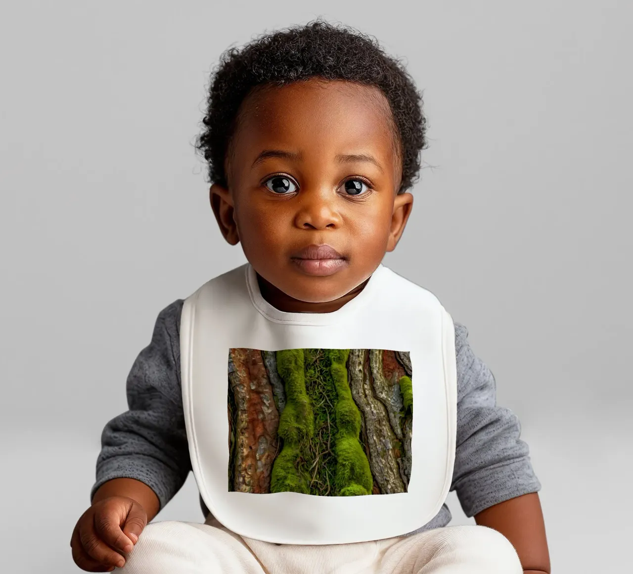 Textured tree bark with vibrant green moss and intricate vin baby bib by DesignDoodle
