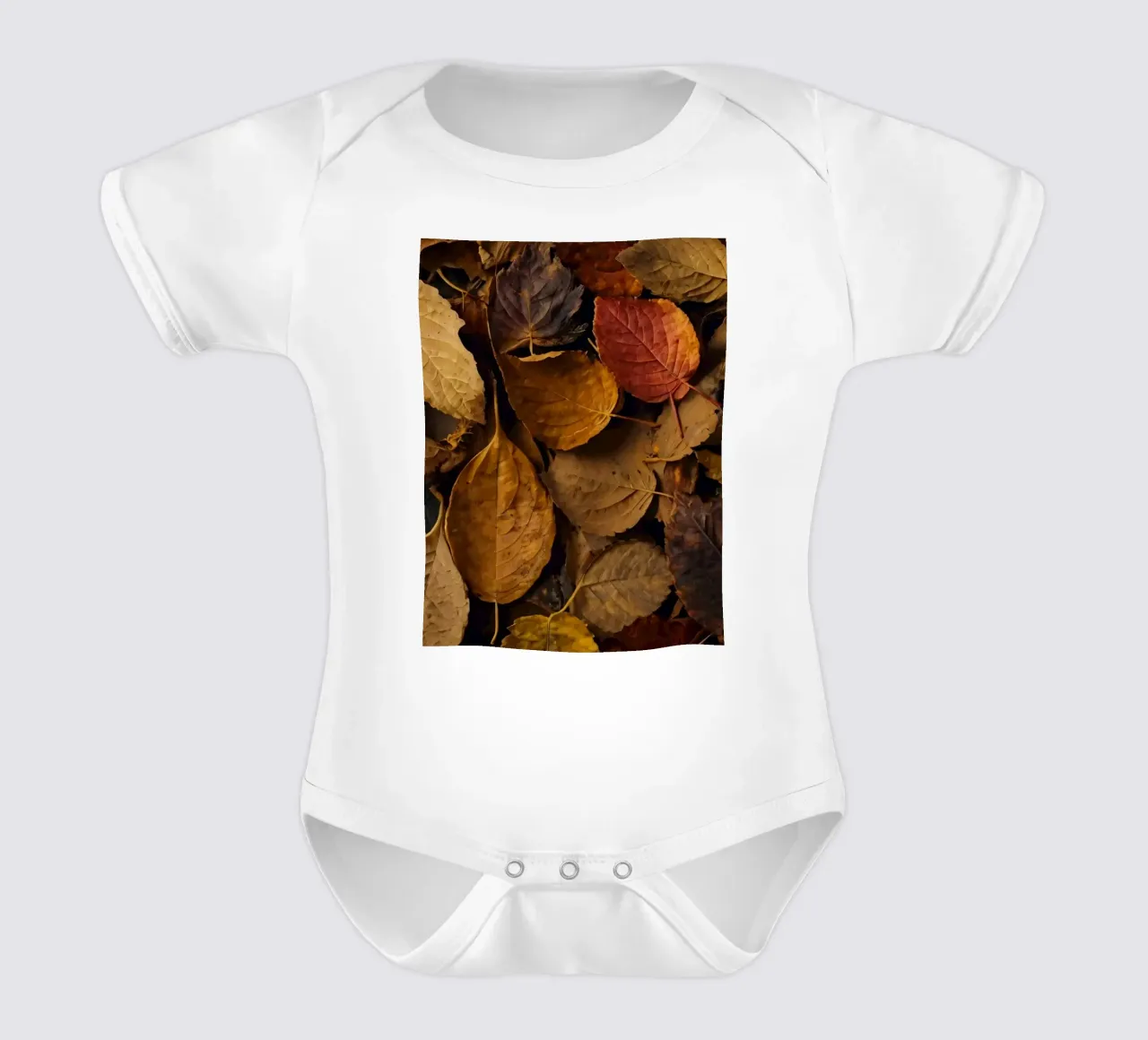 foglie d'autunno sparse a terra body neonato maniche corte da DesignDoodle