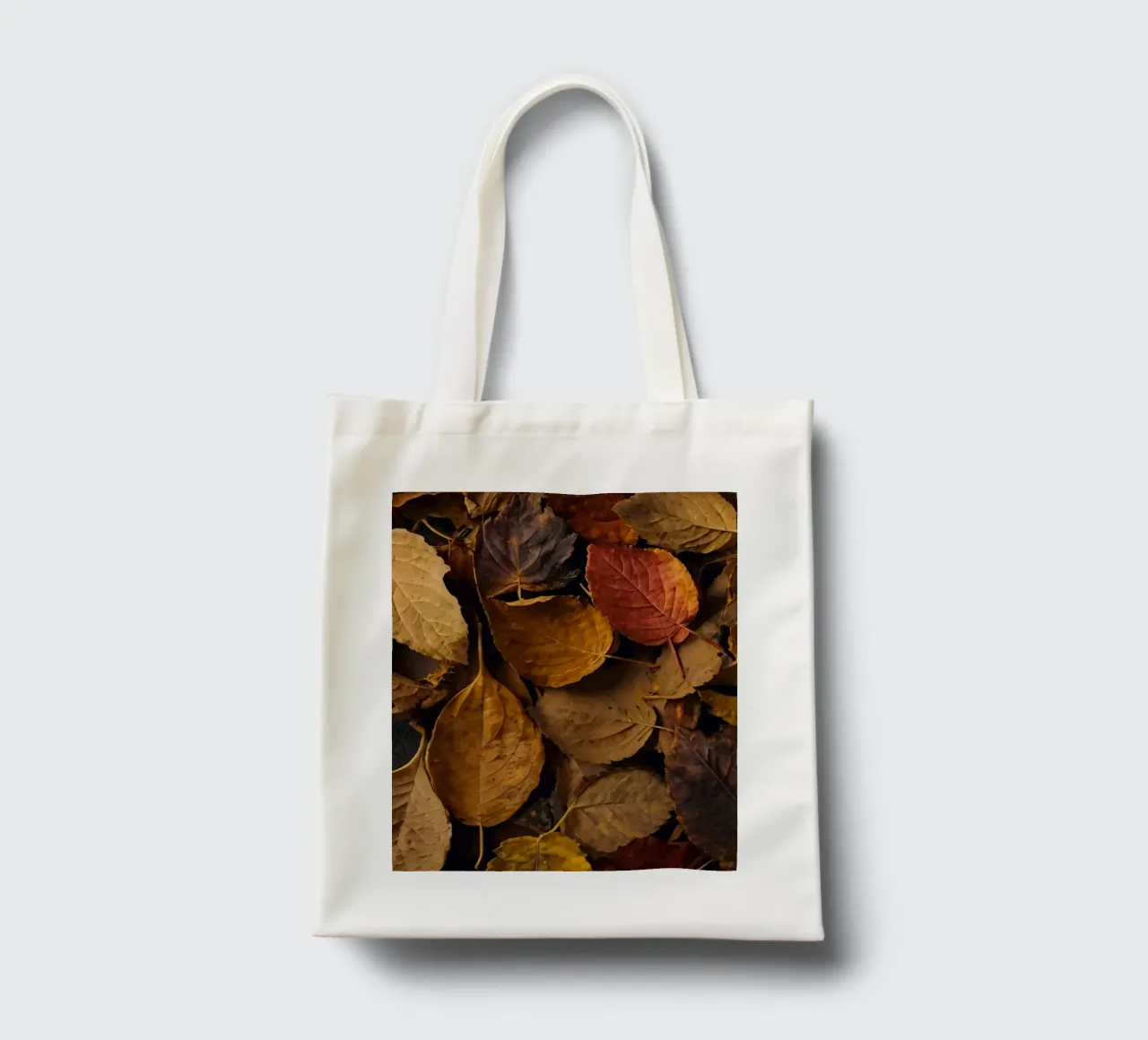 foglie d'autunno sparse a terra borsa in juta da DesignDoodle