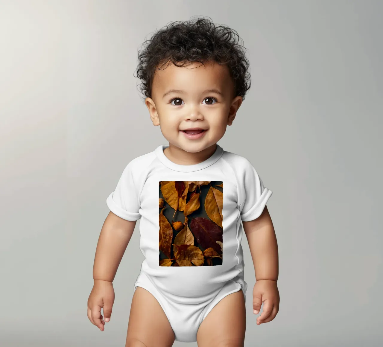 cozy autumn leaves spread create a vibrant seasonal display short-sleeve baby romper by DesignDoodle