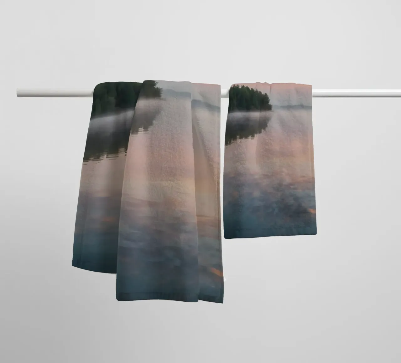 Serene morning at the tranquil lake with mist rising towel by DesignDoodle