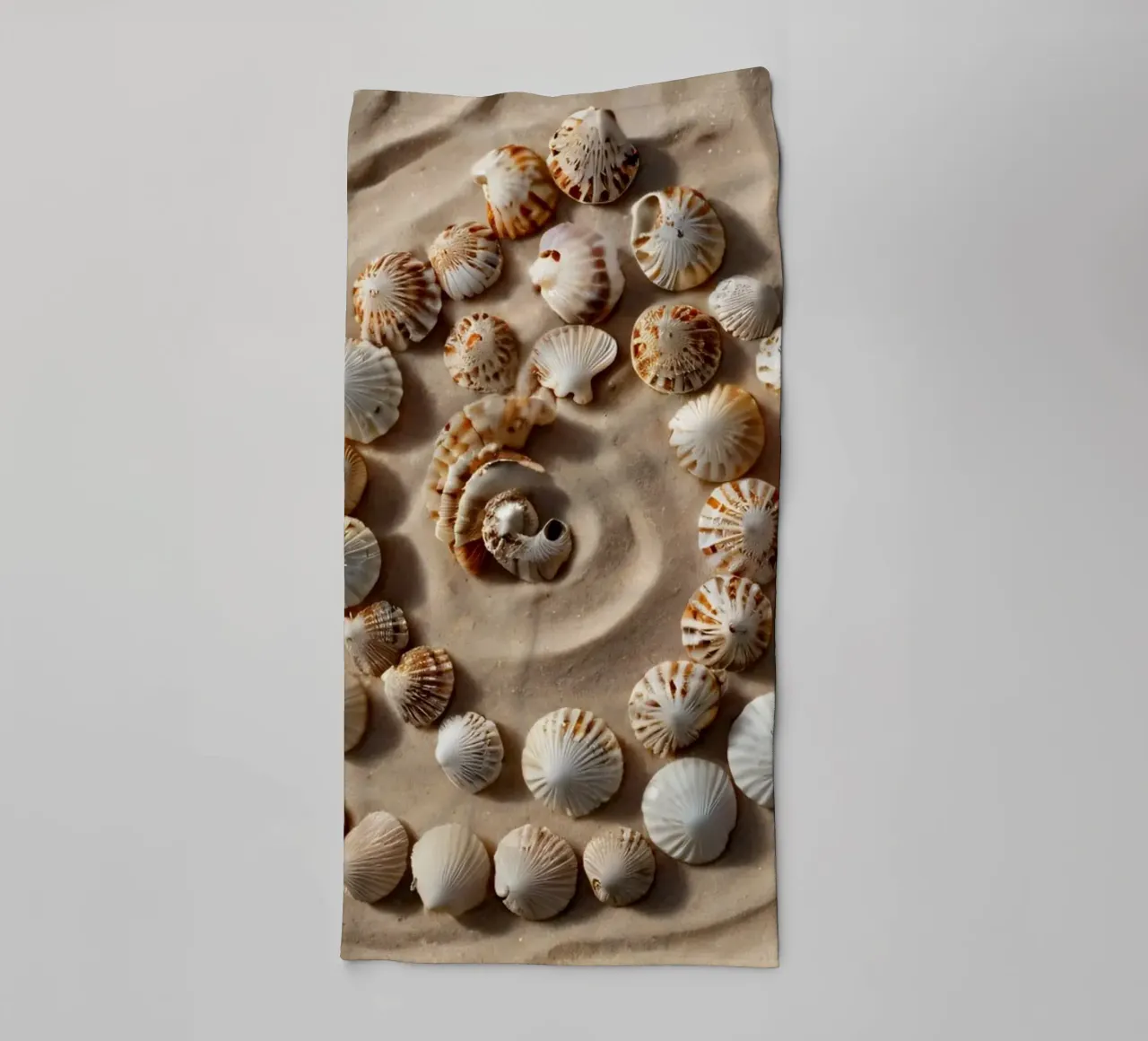 Natural spiral pattern created with seashells arranged towel by DesignDoodle