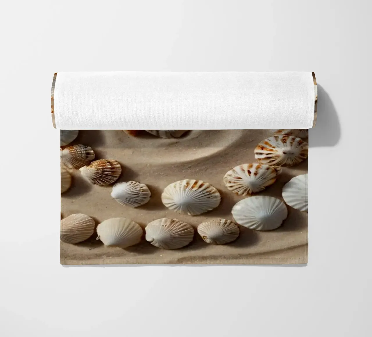Natural spiral pattern created with seashells arranged beach towel by DesignDoodle