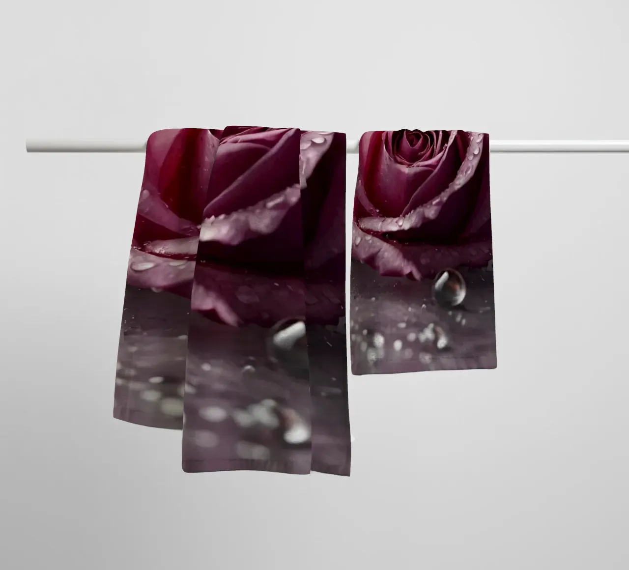 fresh pink roses adorned with dewdrops on a soft surface towel by DesignDoodle