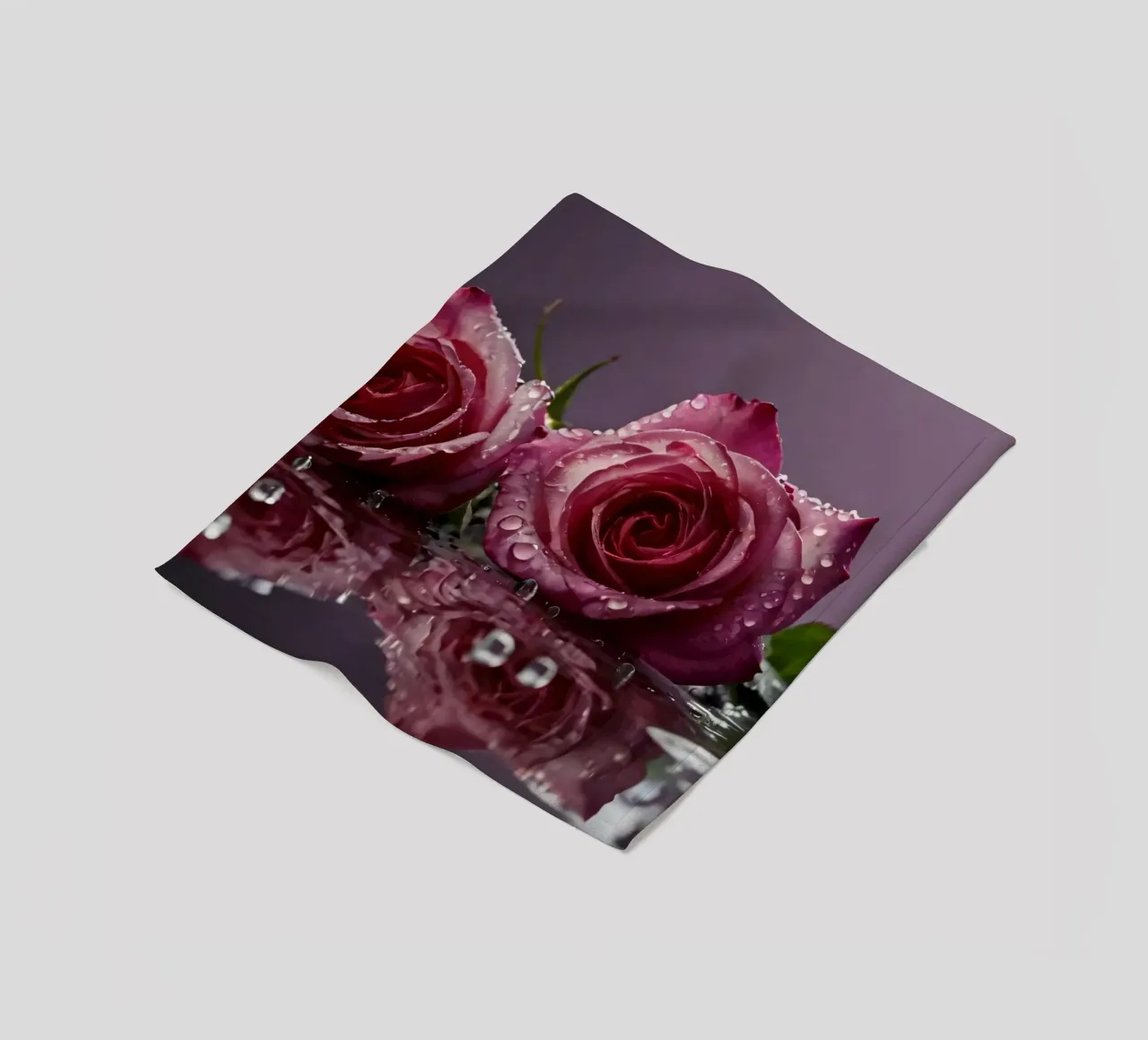 Two dew-kissed pink roses resting on a reflective surface fleece blanket by DesignDoodle