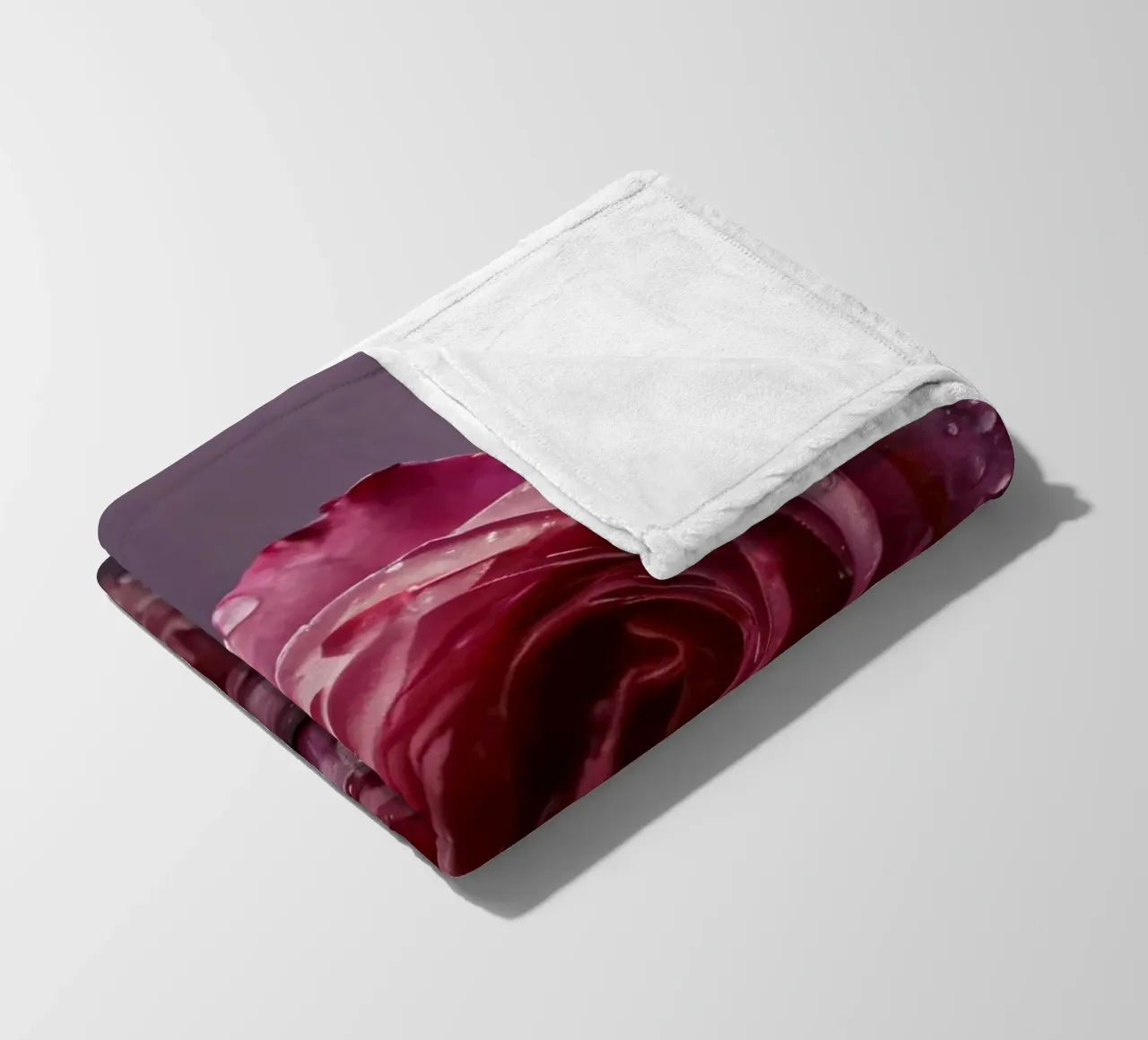 Two dew-kissed pink roses resting on a reflective surface fleece blanket by DesignDoodle