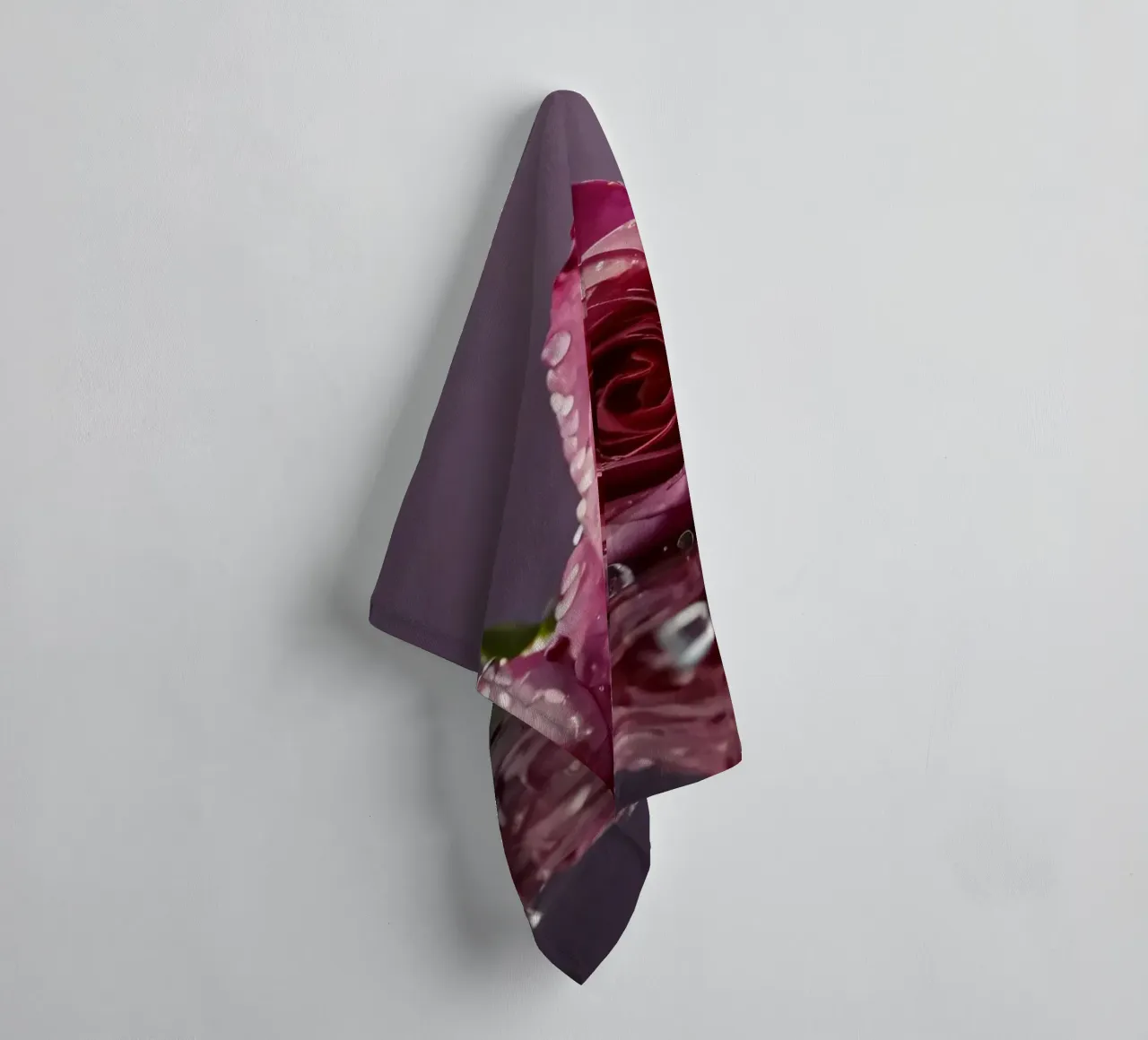 Two dew-kissed pink roses resting on a reflective surface towel by DesignDoodle