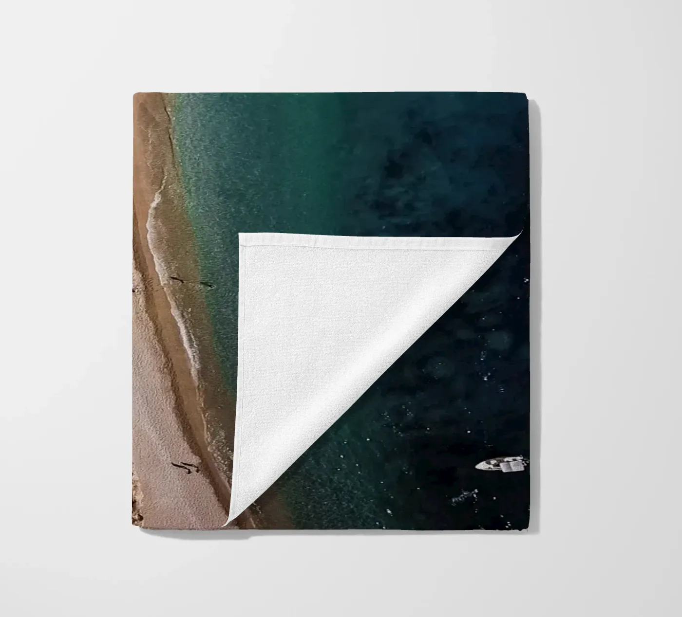 Cliffhanger beach towel by Framative