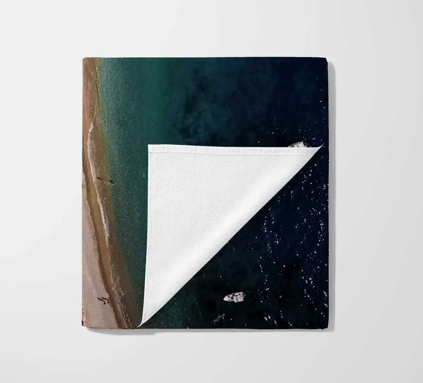 Cliffhanger beach towel by Framative
