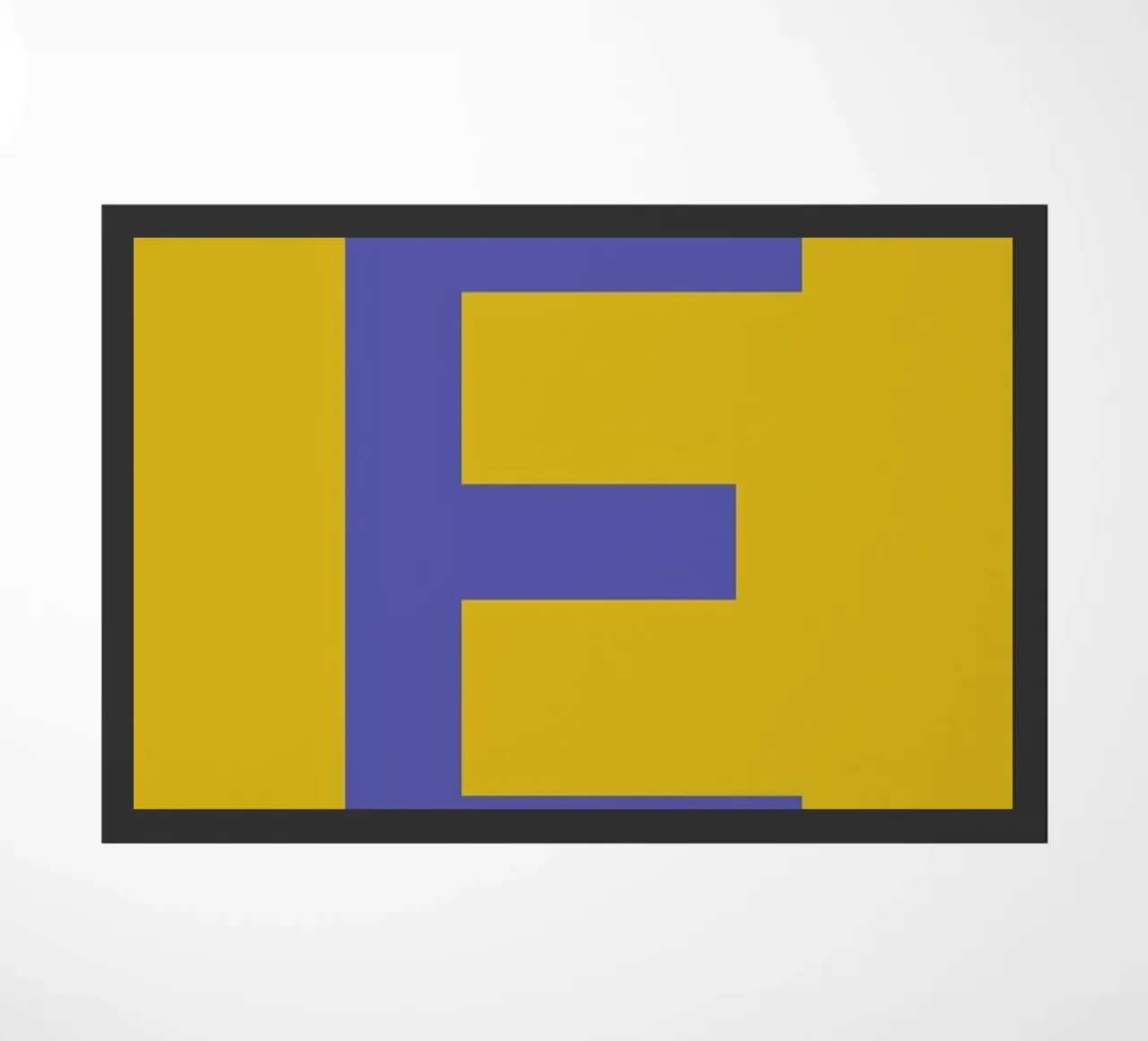 Yellow Letter E doormat by Studio One