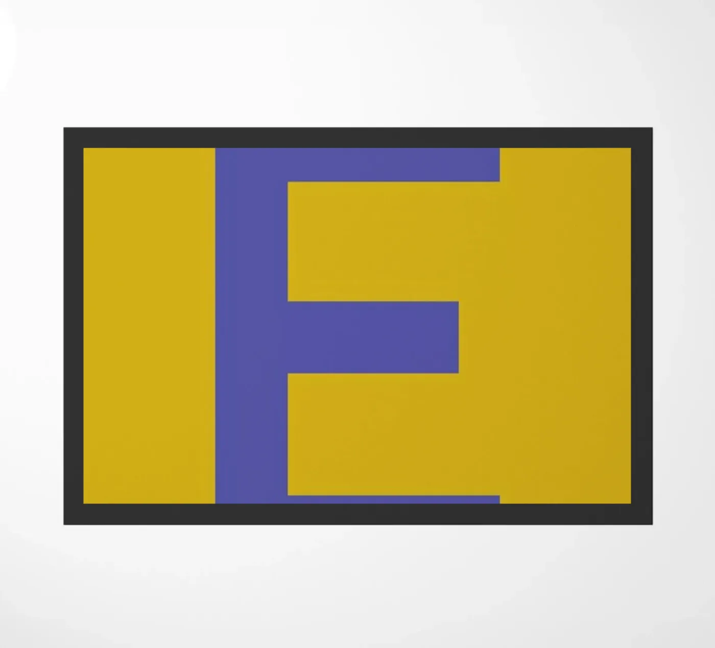 Yellow Letter E doormat by Studio One