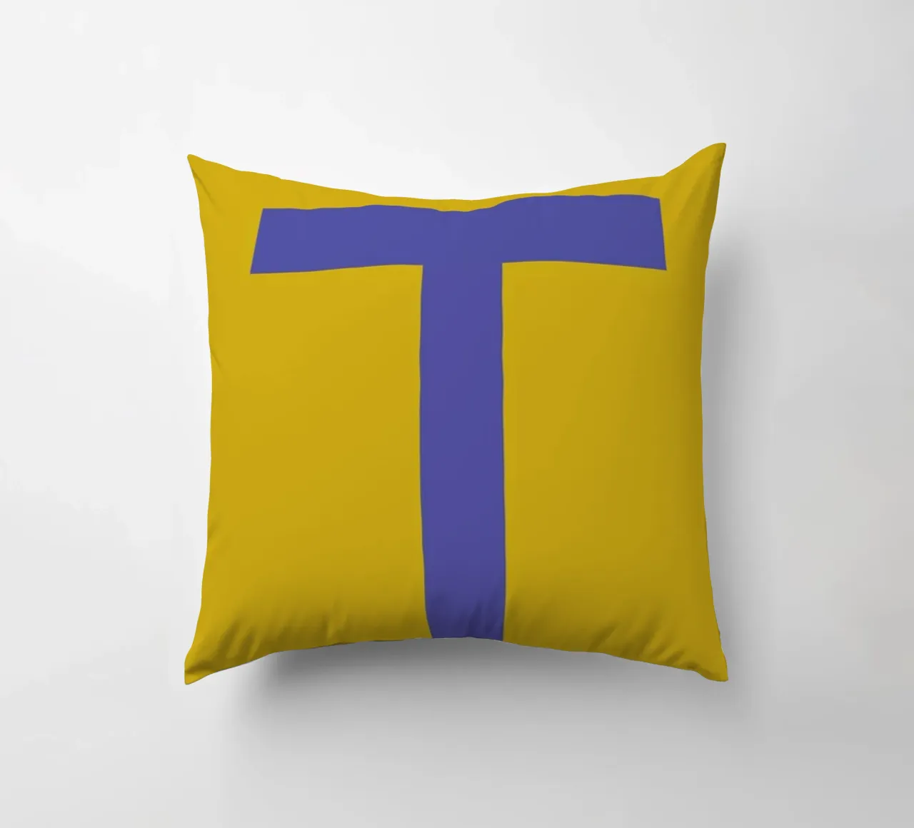 Yellow Letter T decorative cushion by Studio One