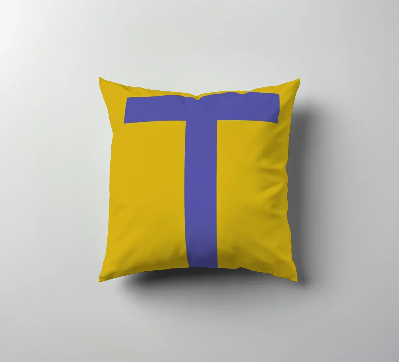 Yellow Letter T decorative cushion by Studio One
