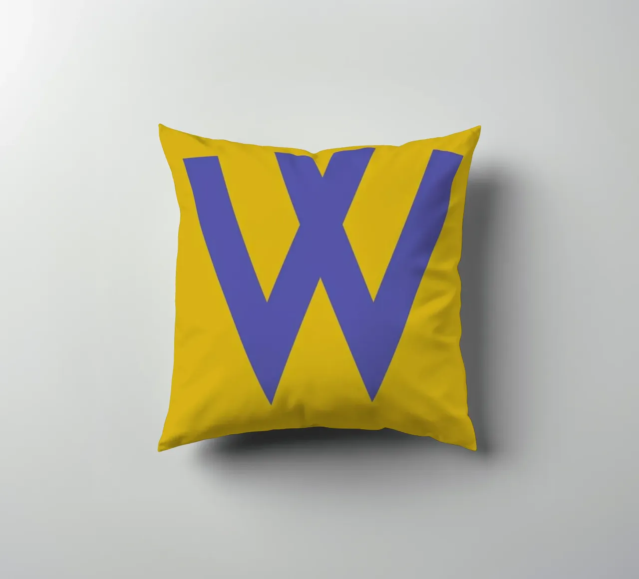 Yellow Letter W decorative cushion by Studio One